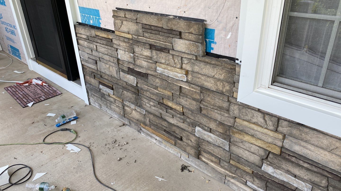 Siding Installation using Certainteed Monogram Charcoal gray and Owens Corning Versetta Stone Sterling by A Plus Exterior