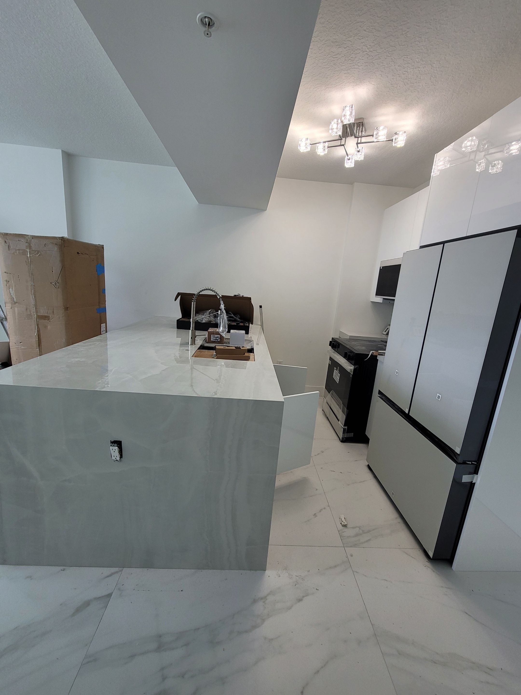 Modern High-Rise Interior Renovation and Custom Tile Installation in Miami by Picos Construction Engineering