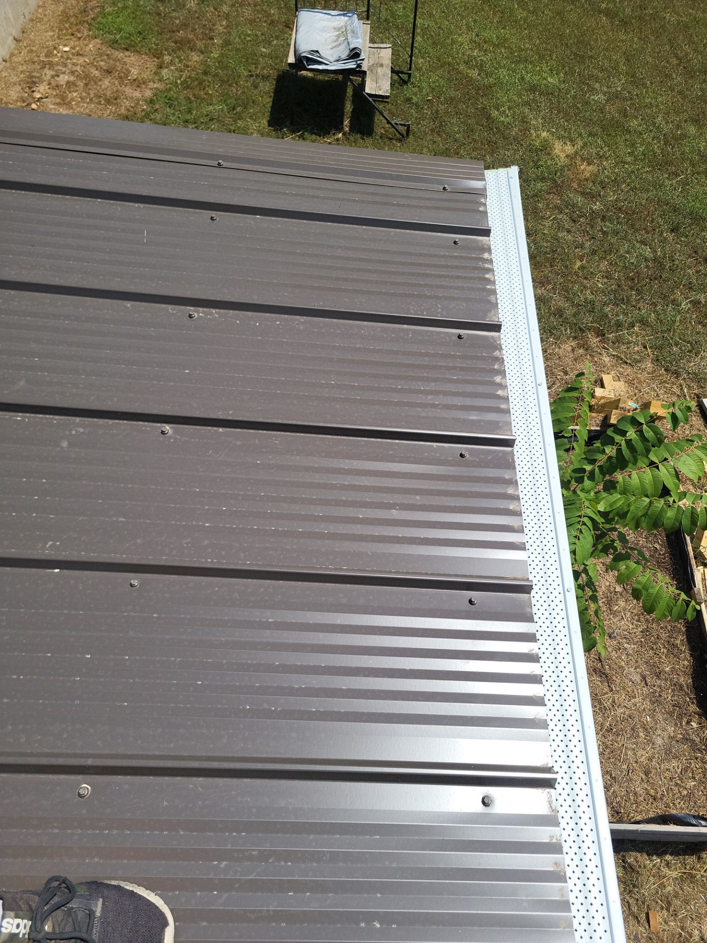 Residential Roof + Gutters & Downspouts & Gutter Covers Install  by Titan Commercial & Residential Roofing 