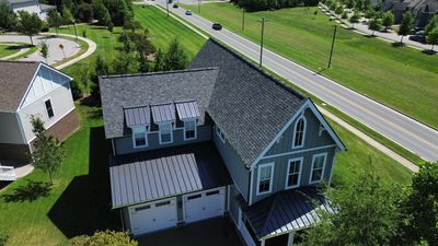 Residential Roof Replacement and Bronze Gutter Installation in Franklin