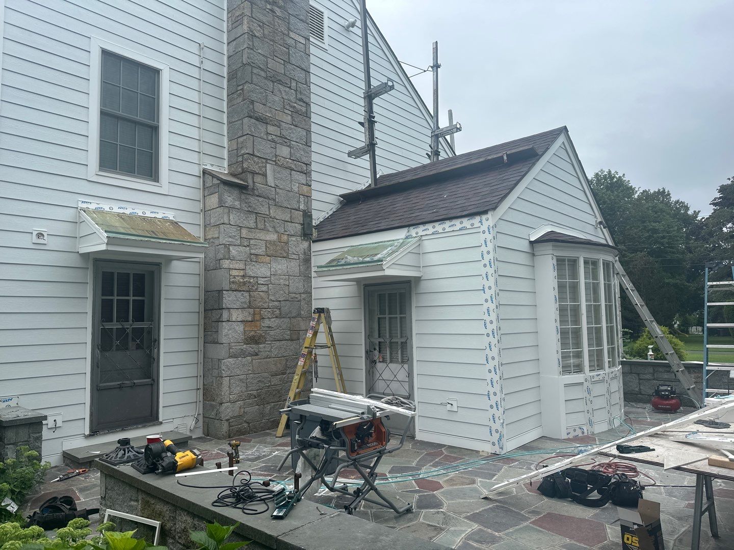 Siding Installation using Hardie Plank Artic white by A Plus Exterior