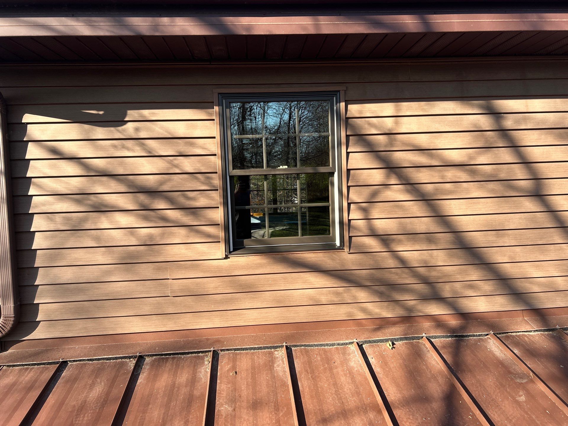 Pella Window installation using Pella Lifestyle wood/Aluminum window by United Windows and Siding LLC