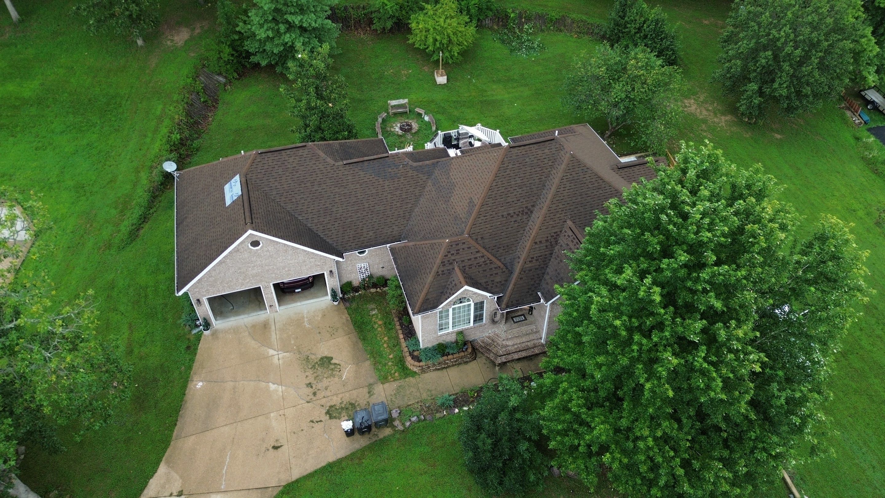 Residential Roofing Install - Green Atlas Pinnacle Pristine Shingles - White Gutters & Downspouts  by Titan Commercial & Residential Roofing 