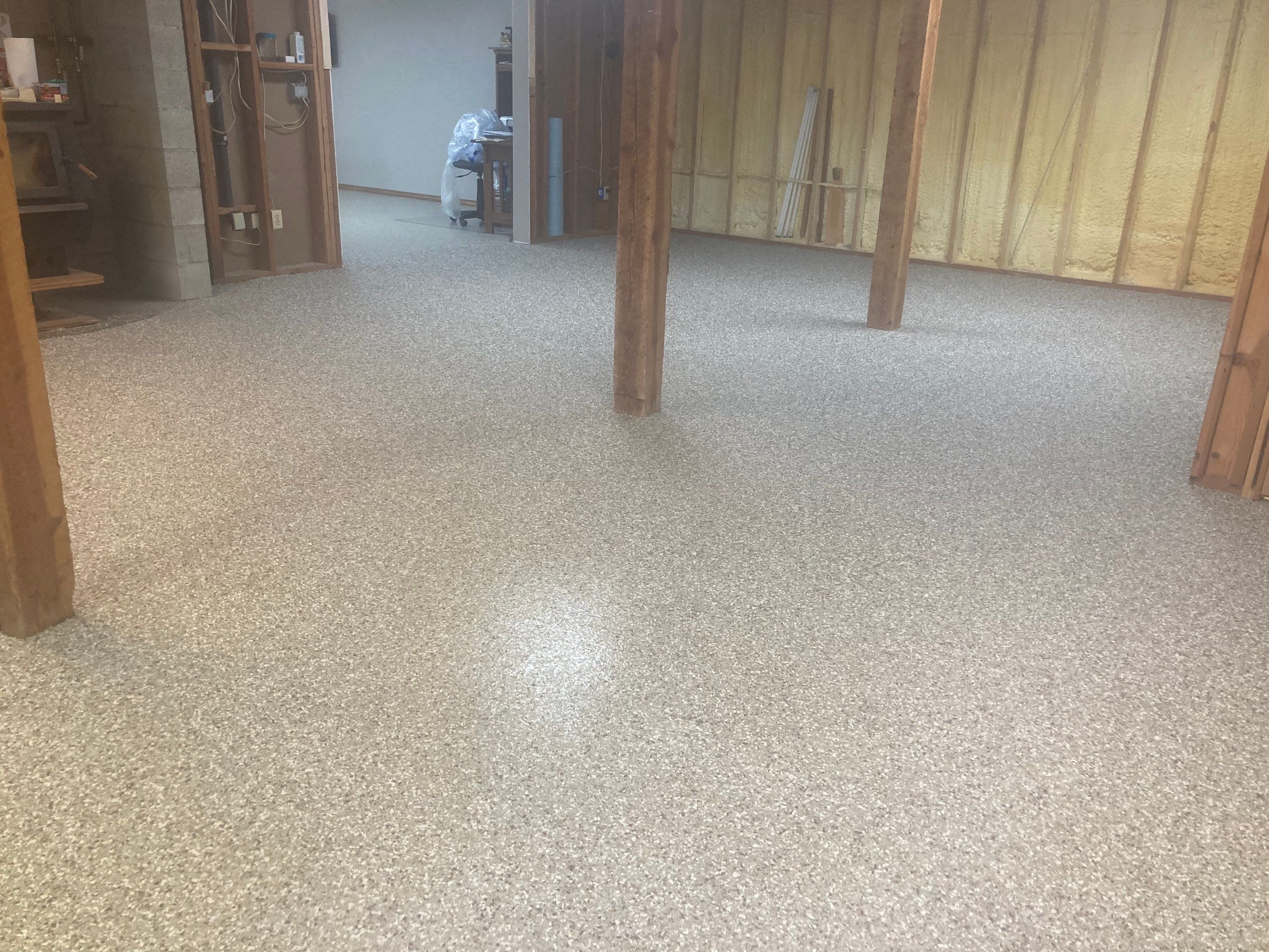 Basement Transformation using Pebble Beach by Croc Coatings, LLC