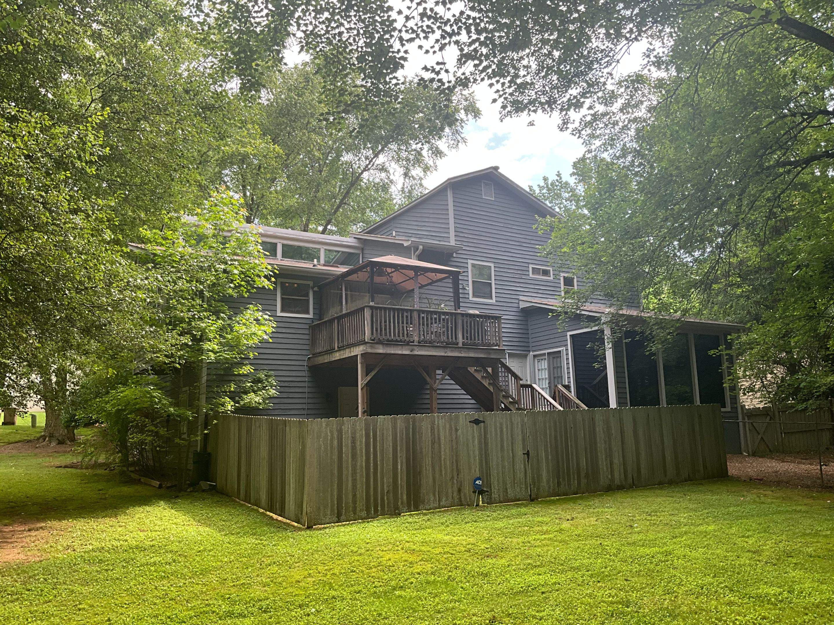 Dark Grey Exterior Painting and Front Door Refresh in Marietta by Swift Home Renovations