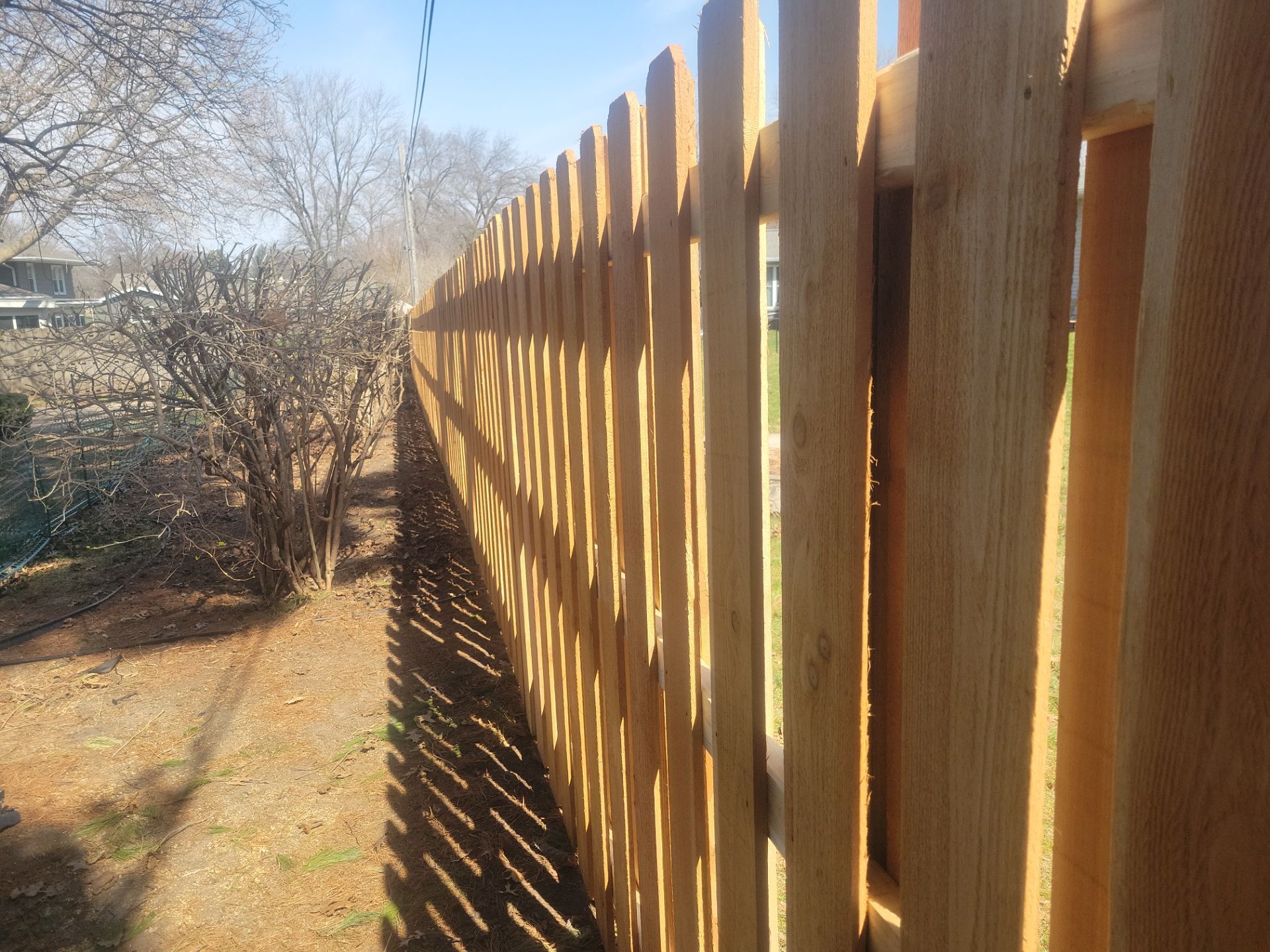 Cedar Shadowbox Wood Privacy Fence Installation in Cedar Falls by Perfect Picket Fence and Stain