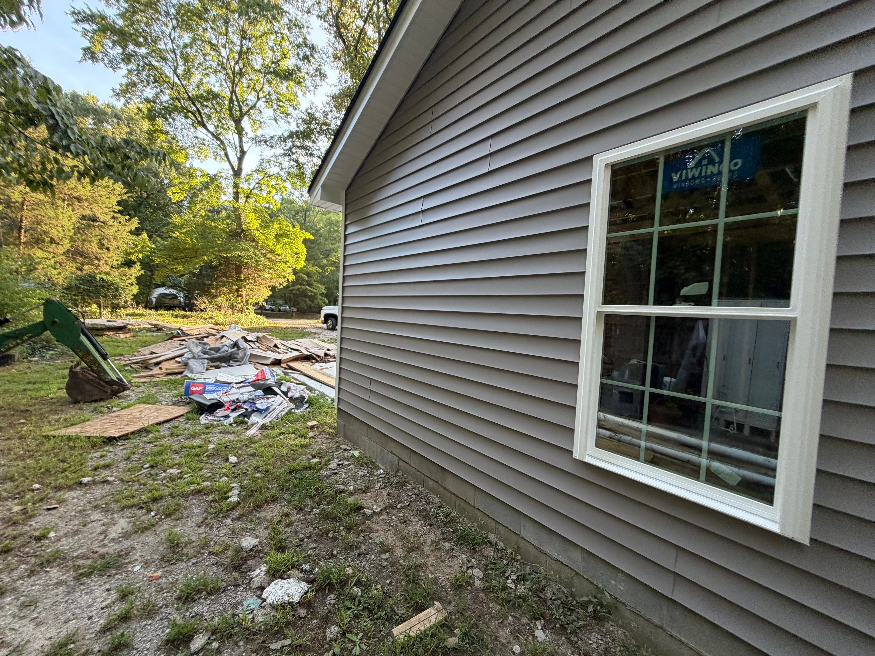 Single-Story New Construction Vinyl Siding Install in Gloucester by Cade Construction