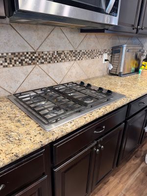 Granite Countertop and Custom Tile Backsplash Installation in Helotes by Mena stone surfaces