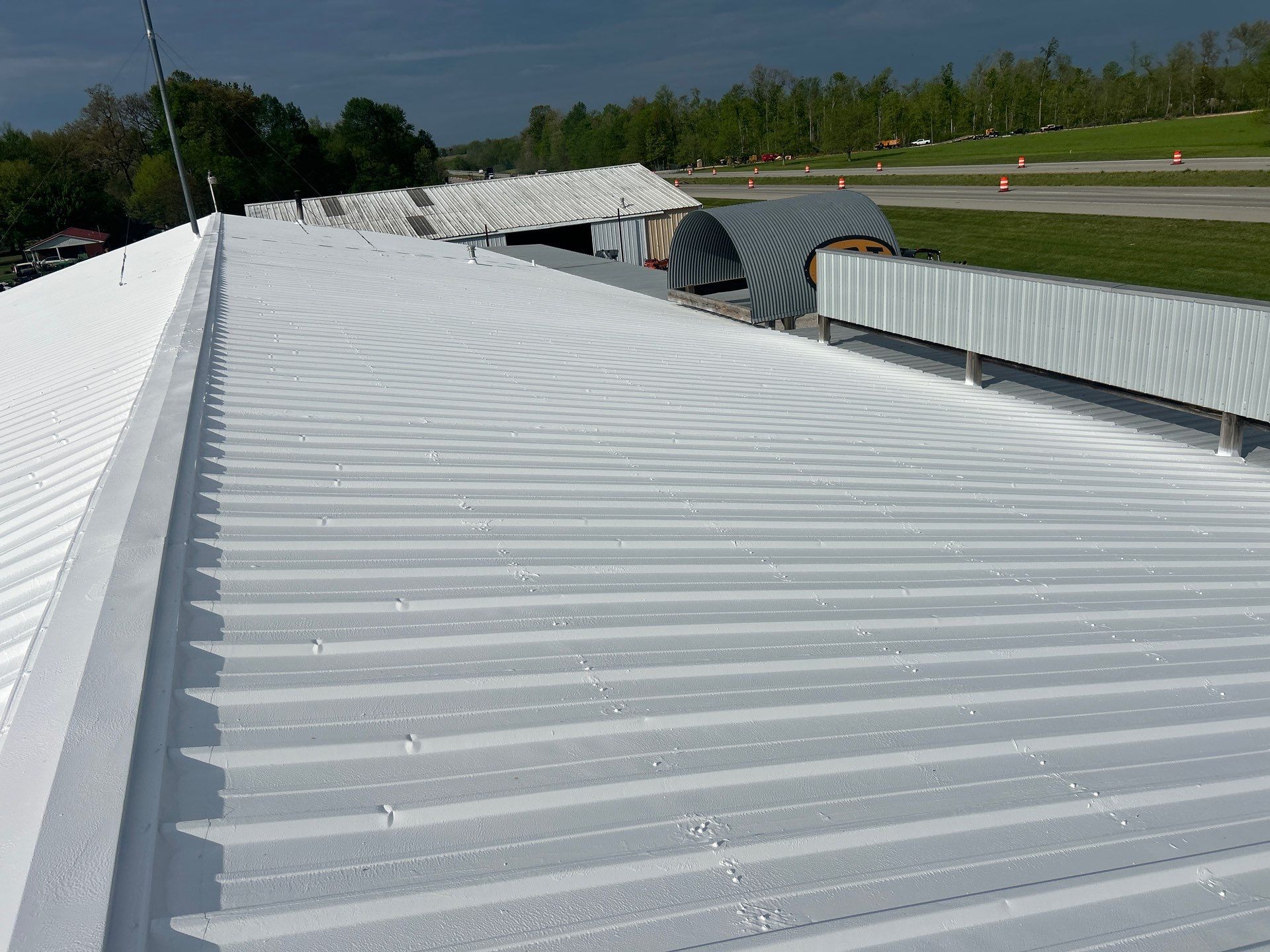 Commercial Metal Roofing Restoration using Coatings by Kentucky Commercial Roofing
