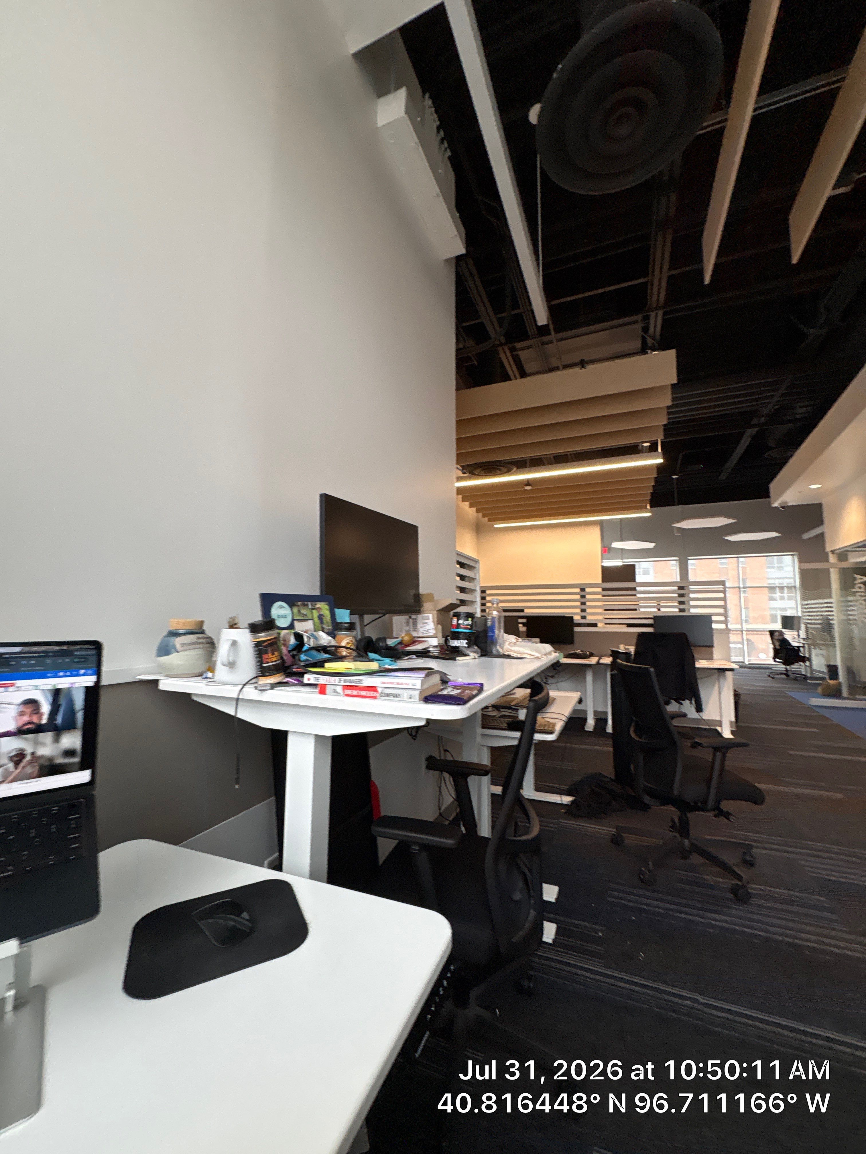 Modern Open-Plan Office Remodel with Acoustic Ceiling Baffles by CompanyCam Sales Demo