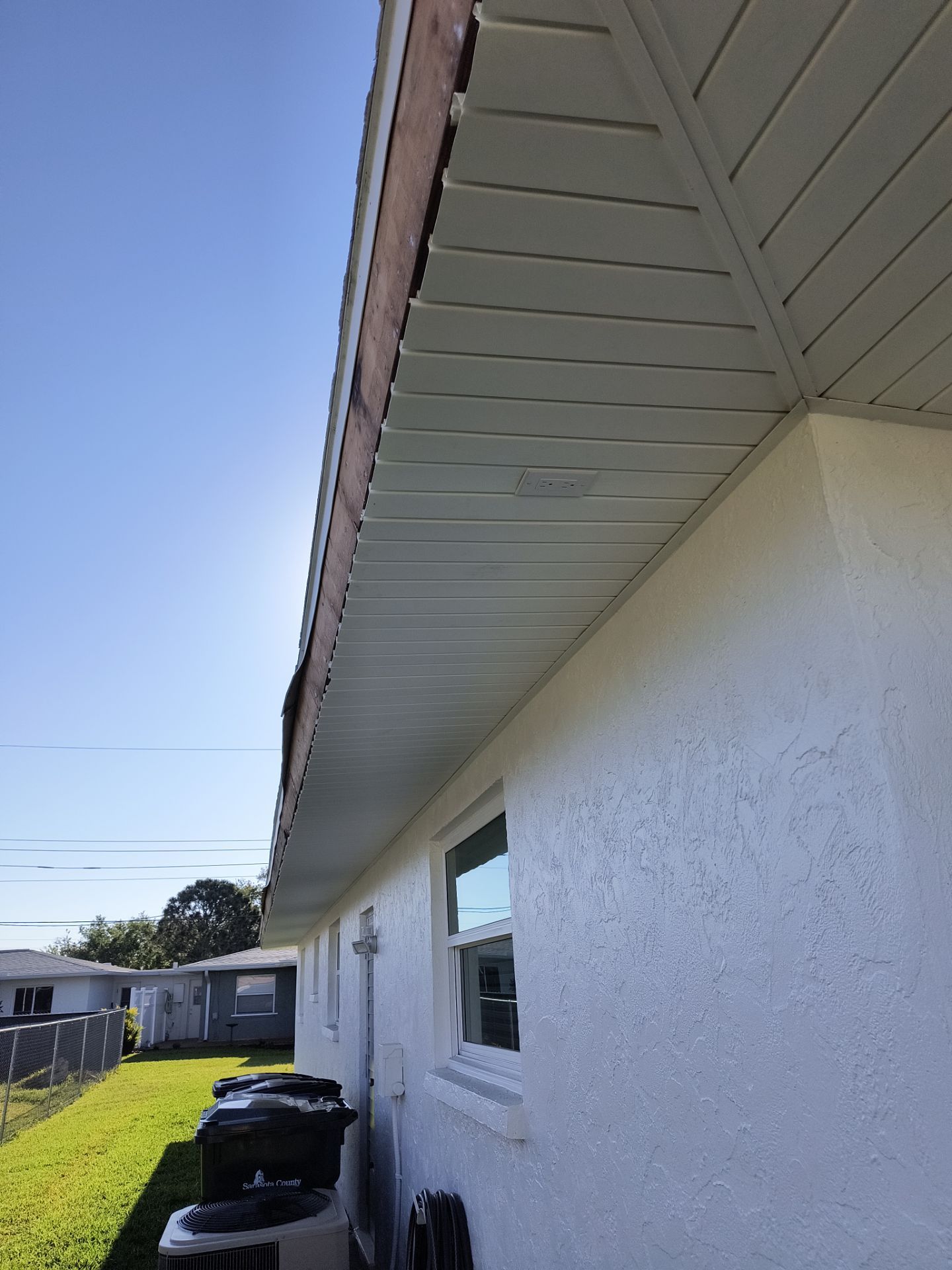 Aluminum White Soffit Installation in Sarasota FL by Gutter Professors