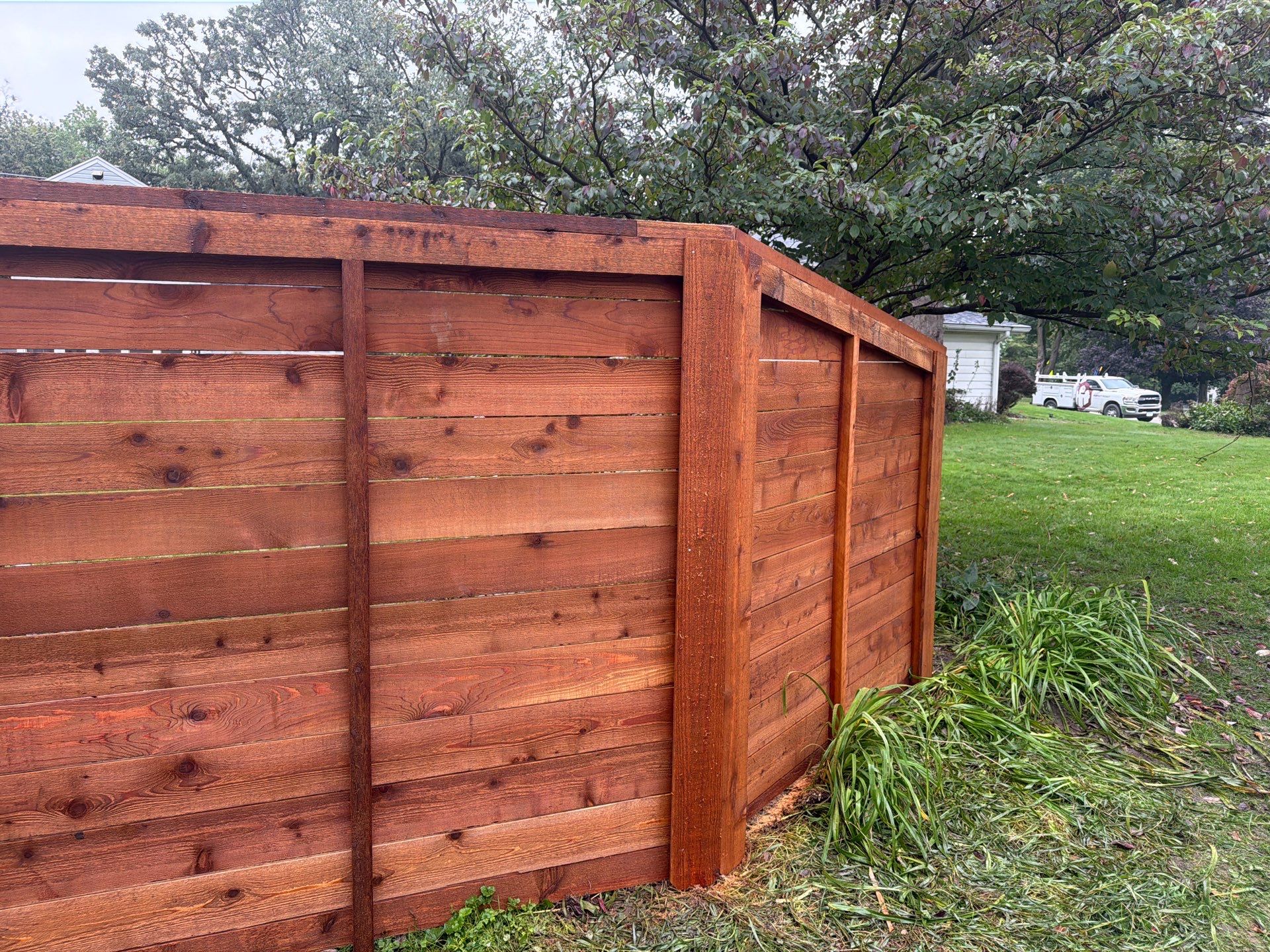 Stained Horizontal Cedar Wood Privacy Fence in Cedar Falls by Perfect Picket Fence and Stain