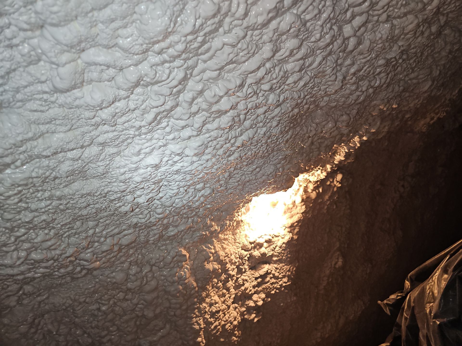Basement Exterior Walls using Closed Cell Spray Foam by NYS Foam & Energy