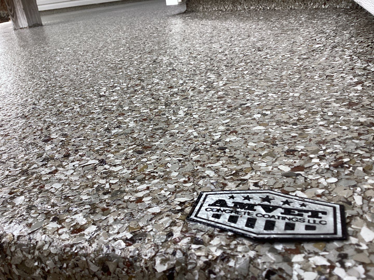 Patio using Pebble Beach by Amvet concrete coatings llc