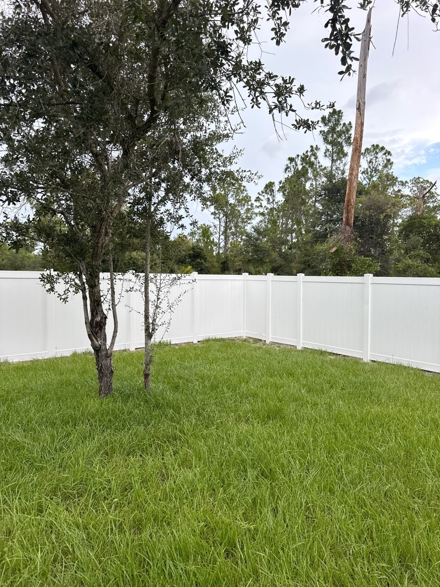 White Vinyl Privacy Fence Installation in North Port by True Fence LLC
