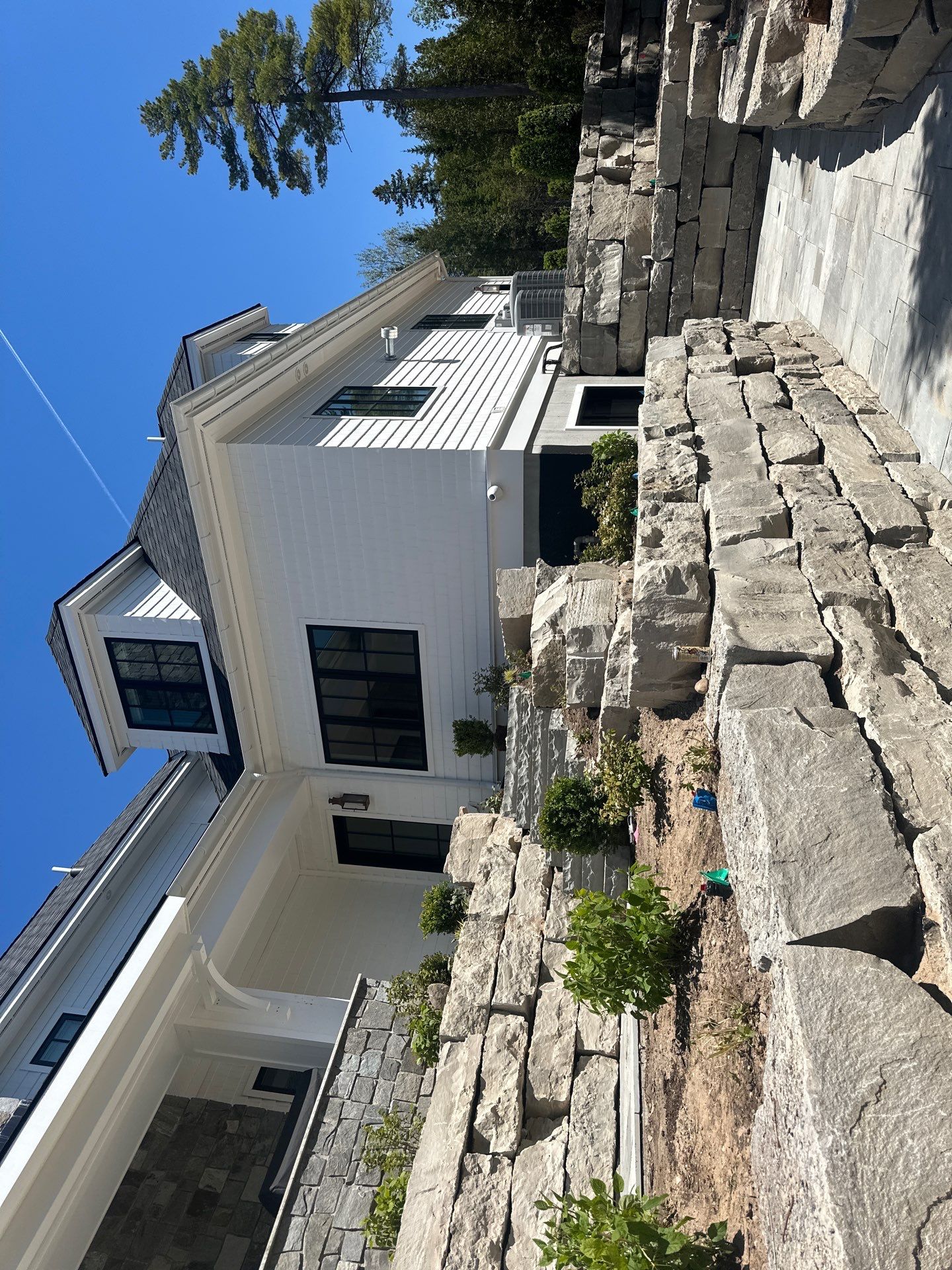 Gutter System and Exterior Drainage Installation in Charlevoix by Rainbow Seamless Systems