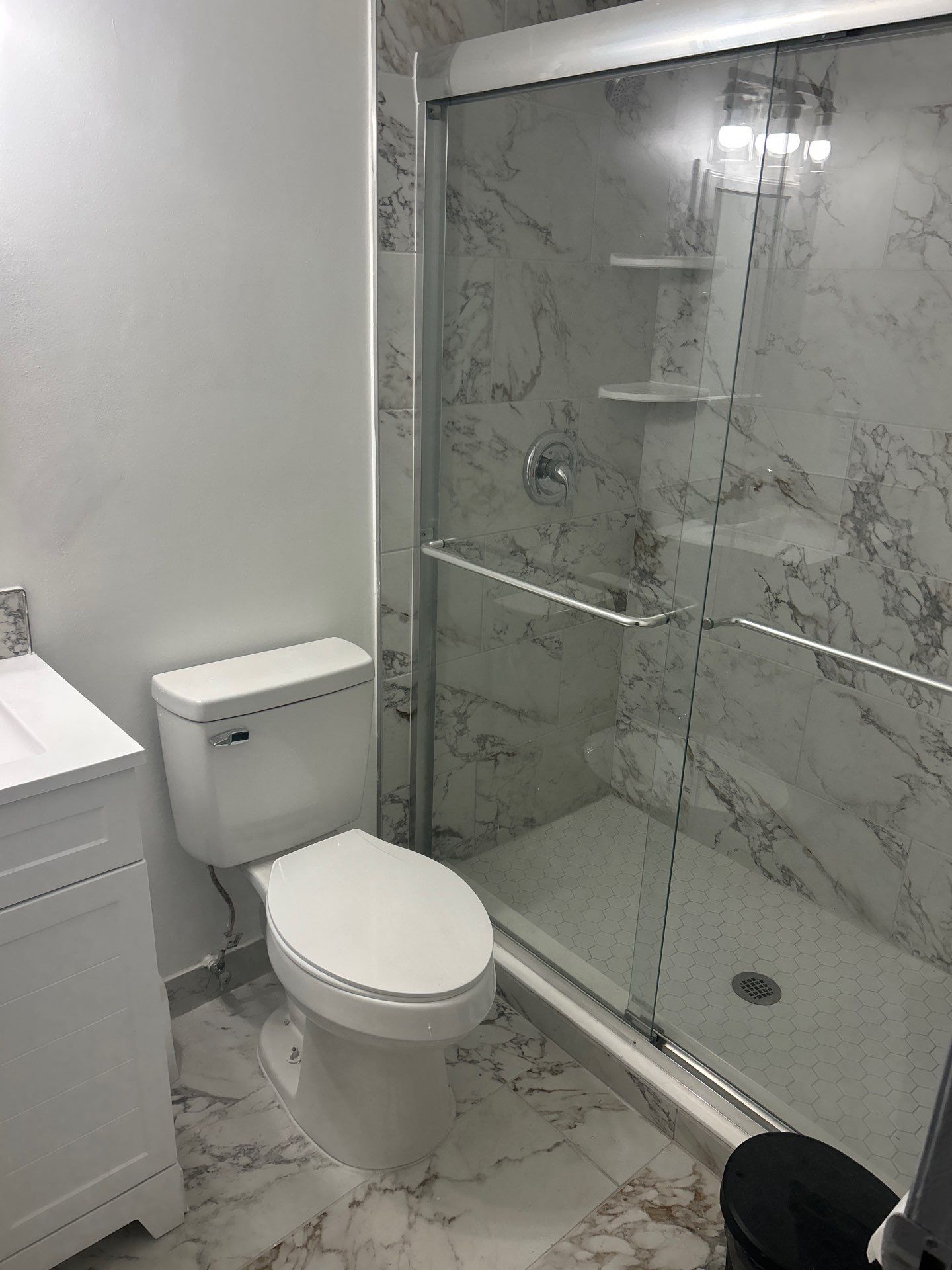 Dual Bathroom Makeover by urban green energy llc