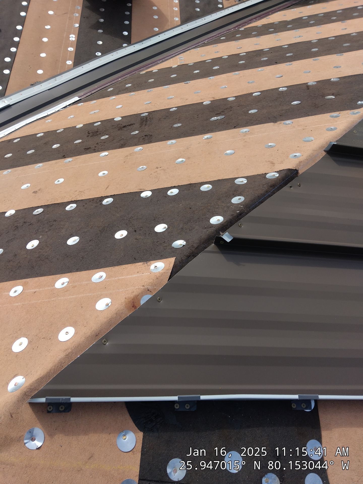 COMMERCIAL REROOF 24 GUAGE MEDIUM BRONZE 1-1/2" MECHANICAL SEAM "ZEBRA METHOD" by Earl W. Johnston Roofing 