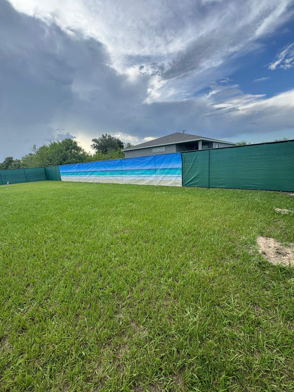 Chain Link Fence Installation with Custom Beach Privacy Screen in Port Charlotte by True Fence LLC