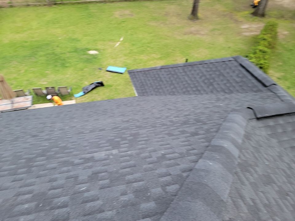 Residential Roofing Installation using Roof Replacement by American Roofing & Construction LLC