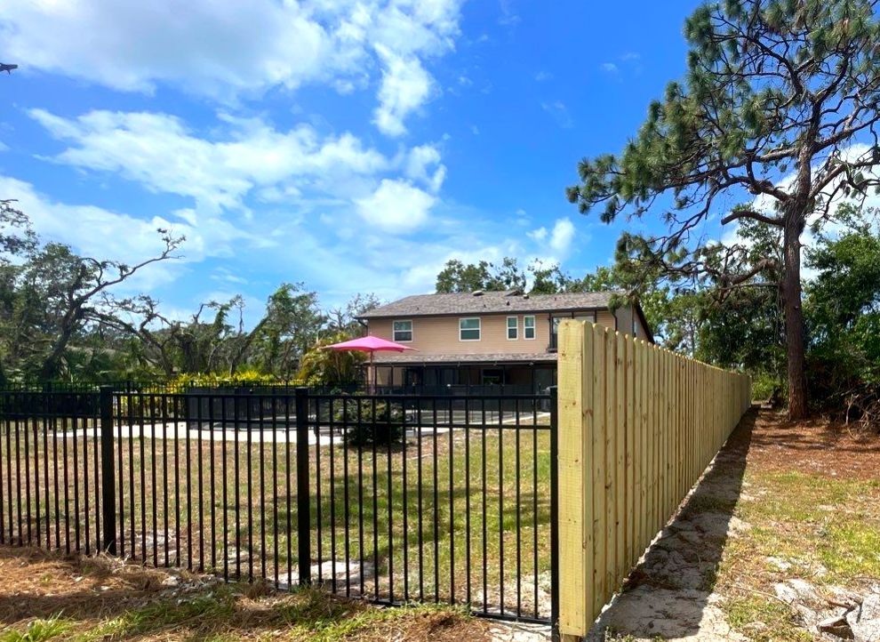 Black Aluminum 3 Rail Fence and Treated Wood Board on Board Privacy Fence  by Asap fence and gates, LLC