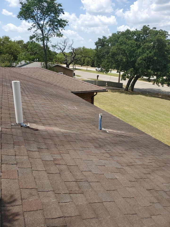 Residential Roofing Installation using Roofing Shingles by Harvey Roofing & Construction