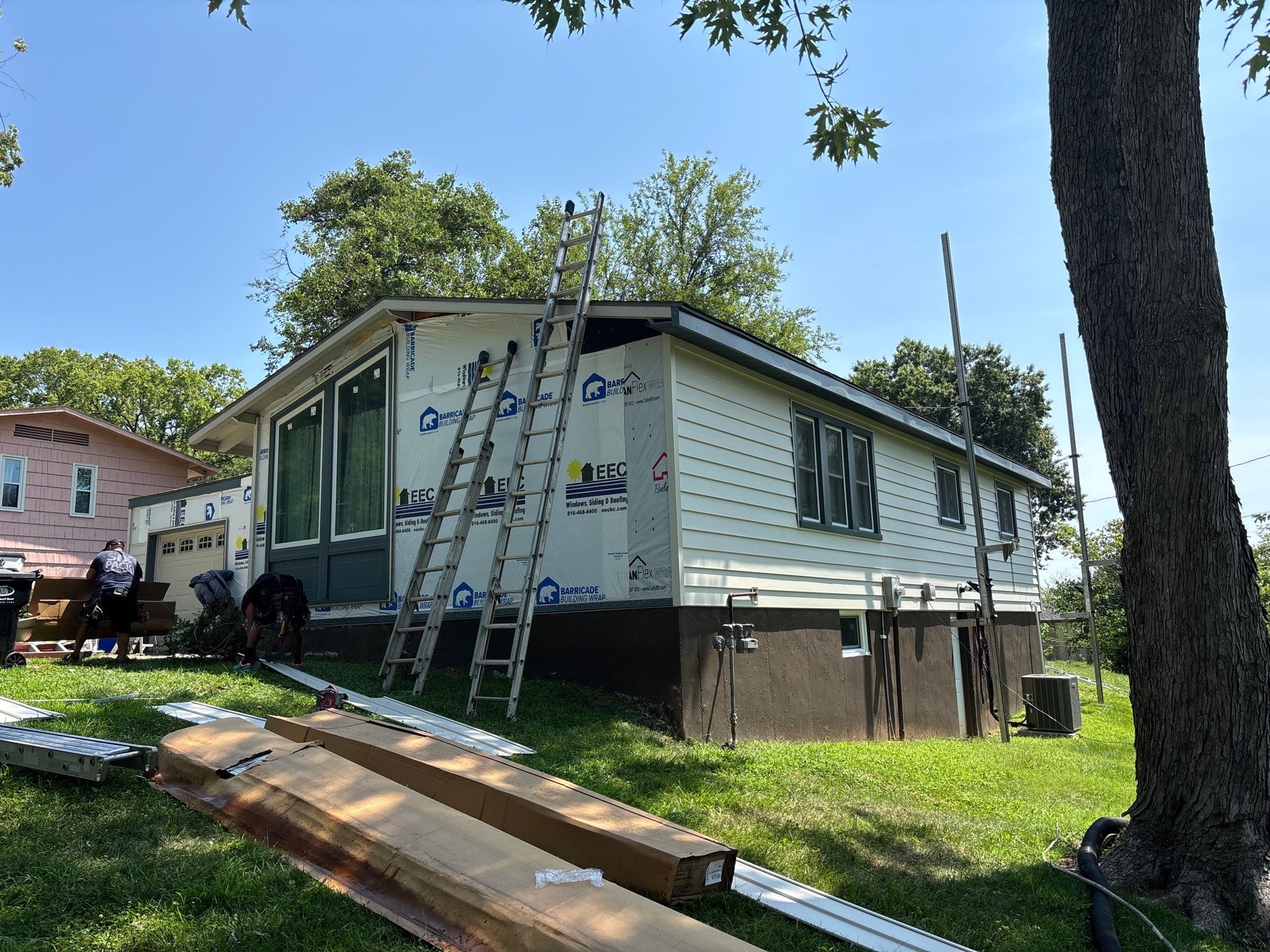 Complete Exterior Transformation With Craneboard Siding and Heartland Windows by EEC Windows, Siding & Roofing