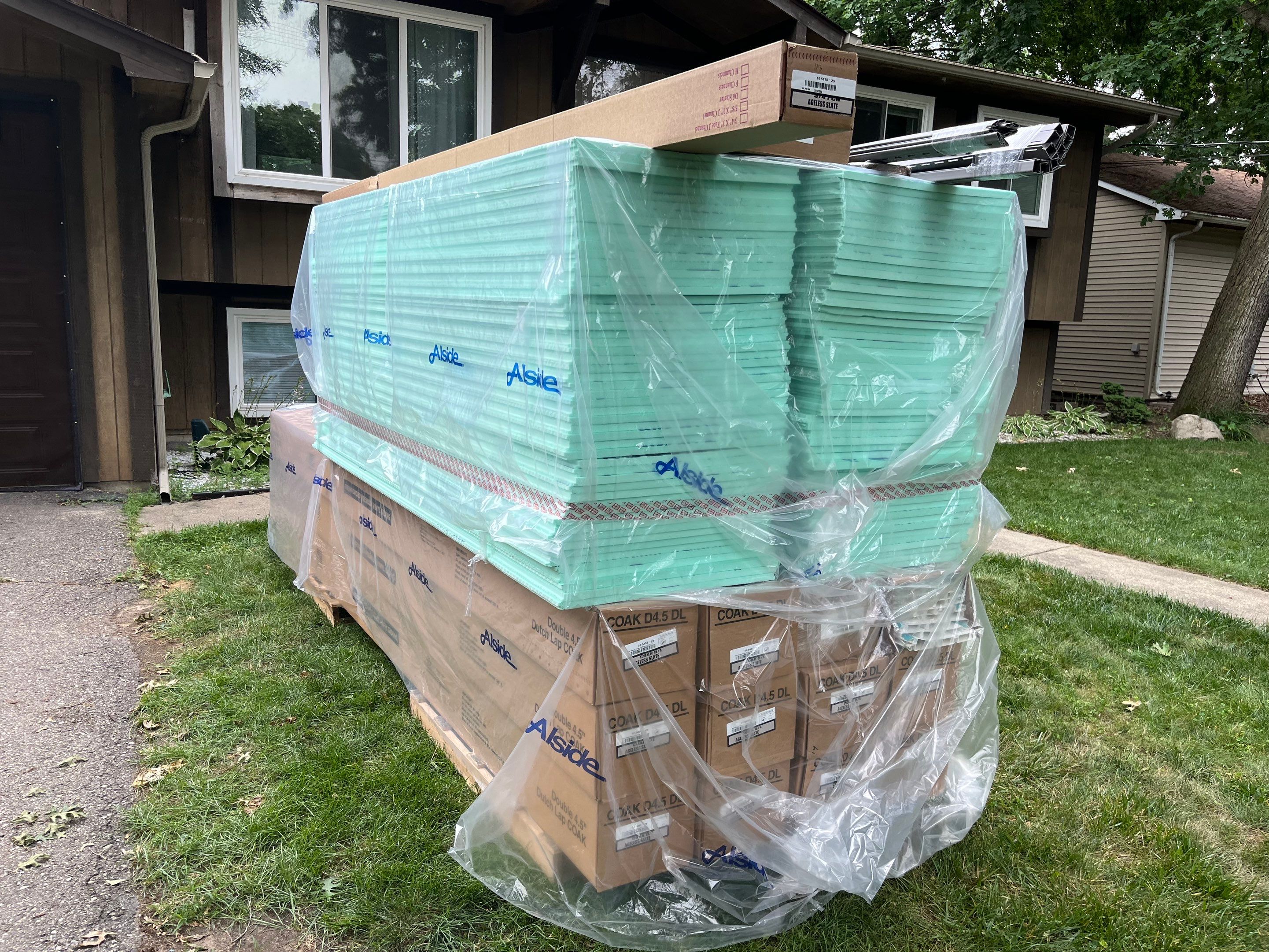 Siding Replacement using Alside D4 Odyssey-Plus Dutchlap Ageless Slate by 180 Contractors