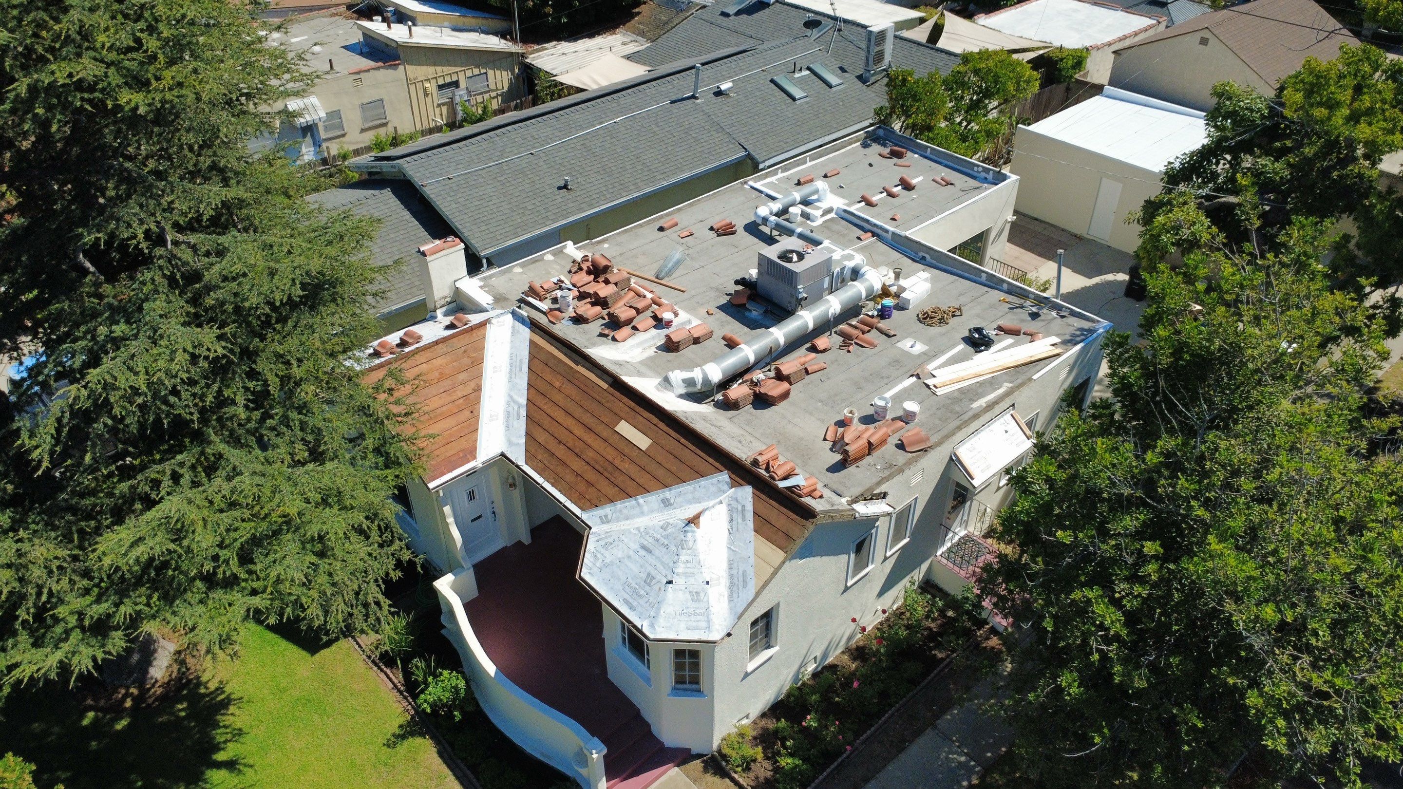 Tile Reset and Silicone Membrane Installation by Hull Brothers Roofing