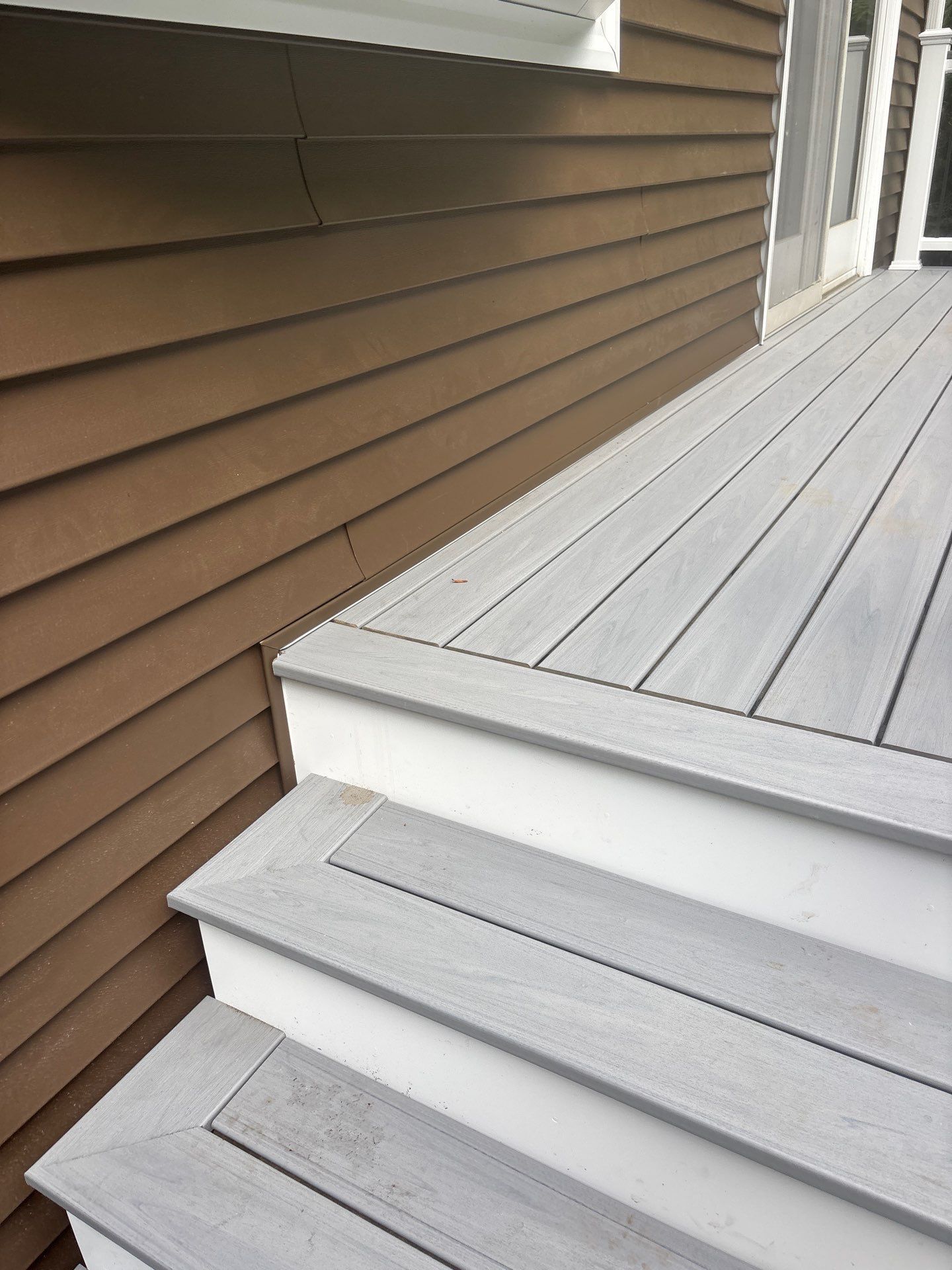 Deck replacement using Trex Lineage Rainier, Cocktail Rail, Rainescape by DiGiorgi Roofing and Siding Inc