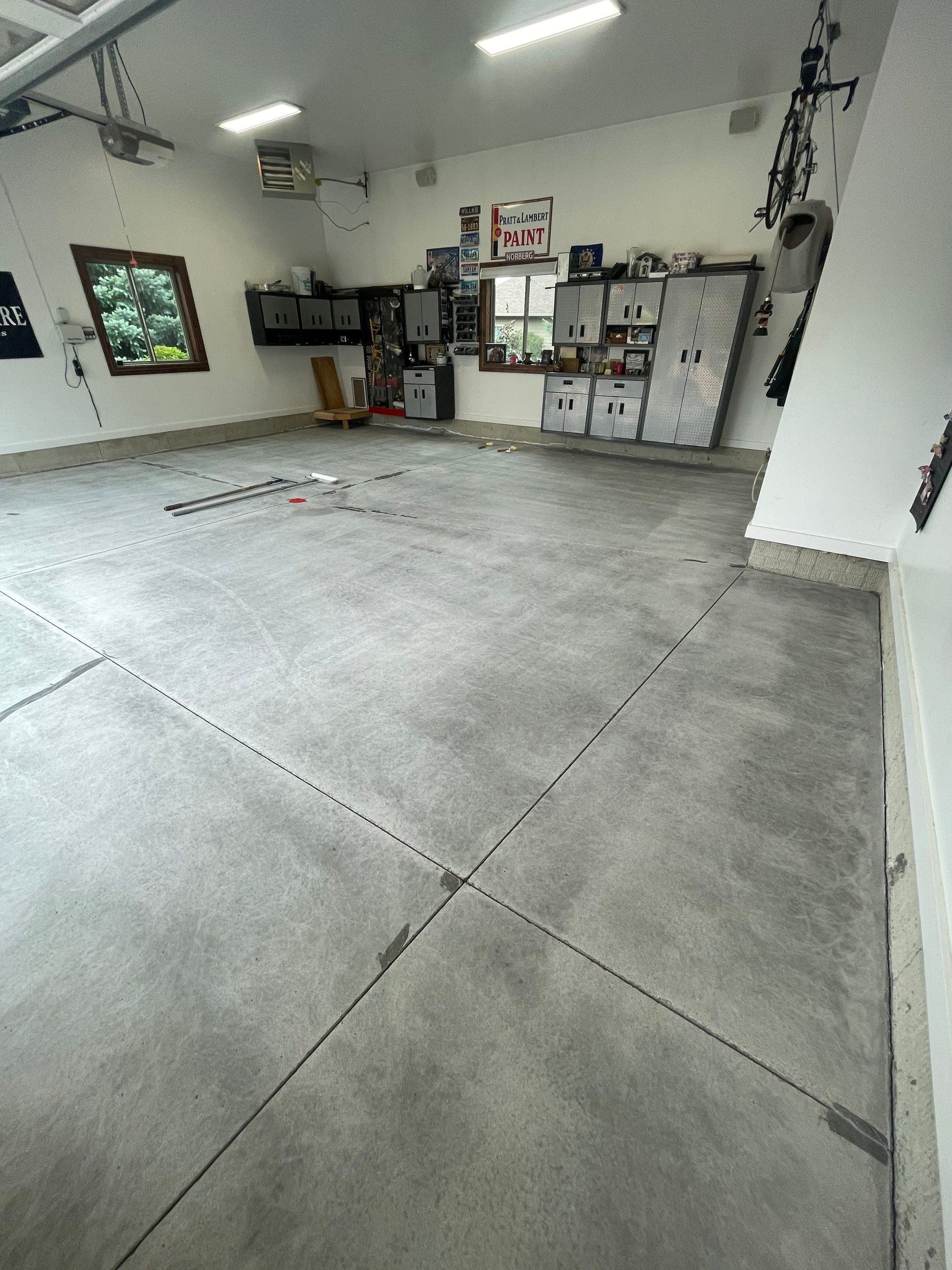Garage Floor Coating and Domino Flake Finish in Sioux Falls by Select Painting, Coatings & Garage Cabinets