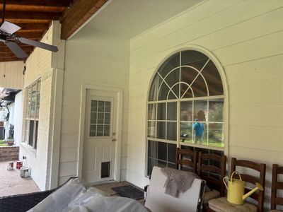Project in TylerExterior Painting in Tyler, TX | White Brick Home, Varnished Fence & Shed Painting