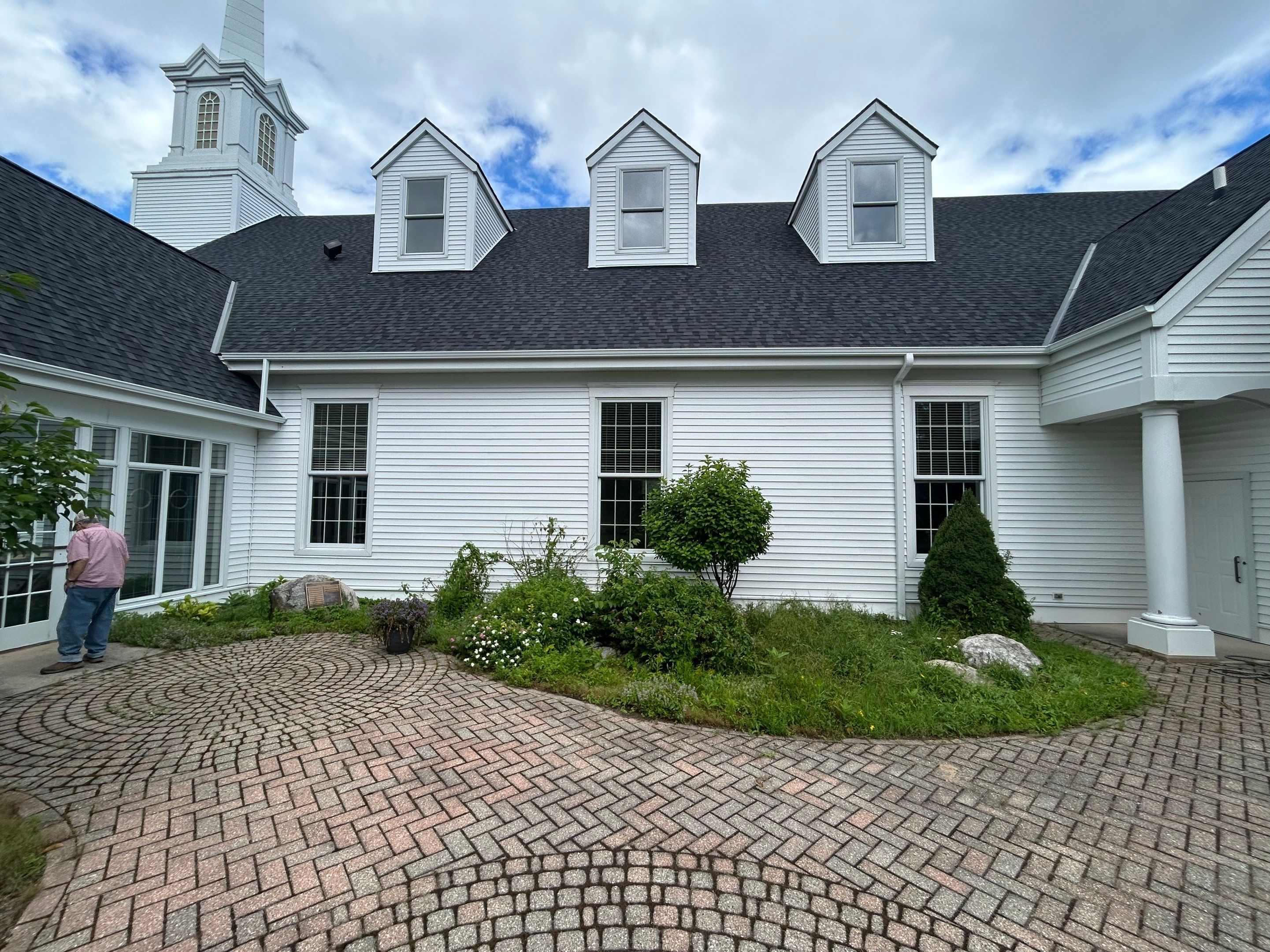 Gutter and Gutter Screen Installation for Harbor Springs Church by Rainbow Seamless Systems