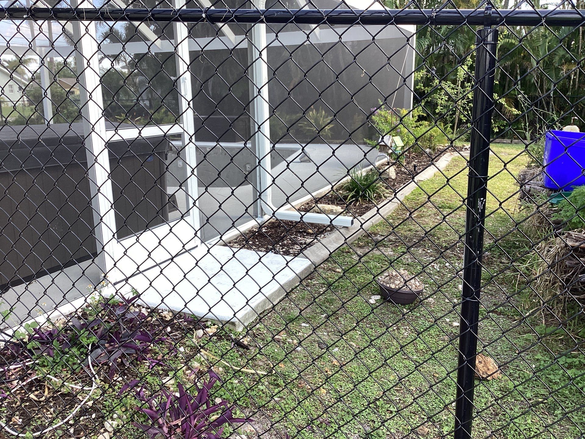 Downspout Installation using 3X4 Elbow Downspout in Cape Coral FL by Gutter Professors