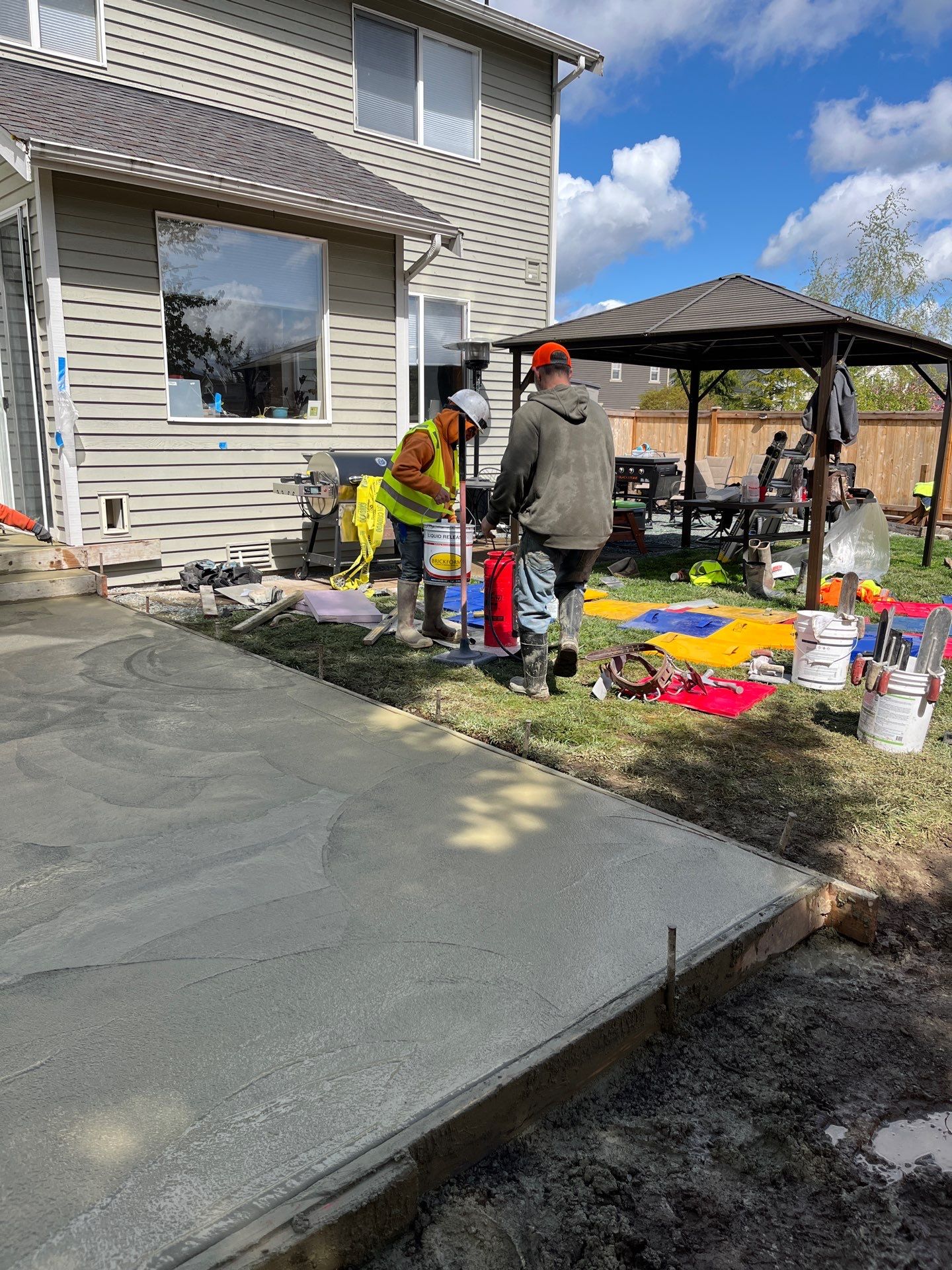 Benedict | Stamped Concrete Back Patio by Jireh Asphalt & Concrete Inc 