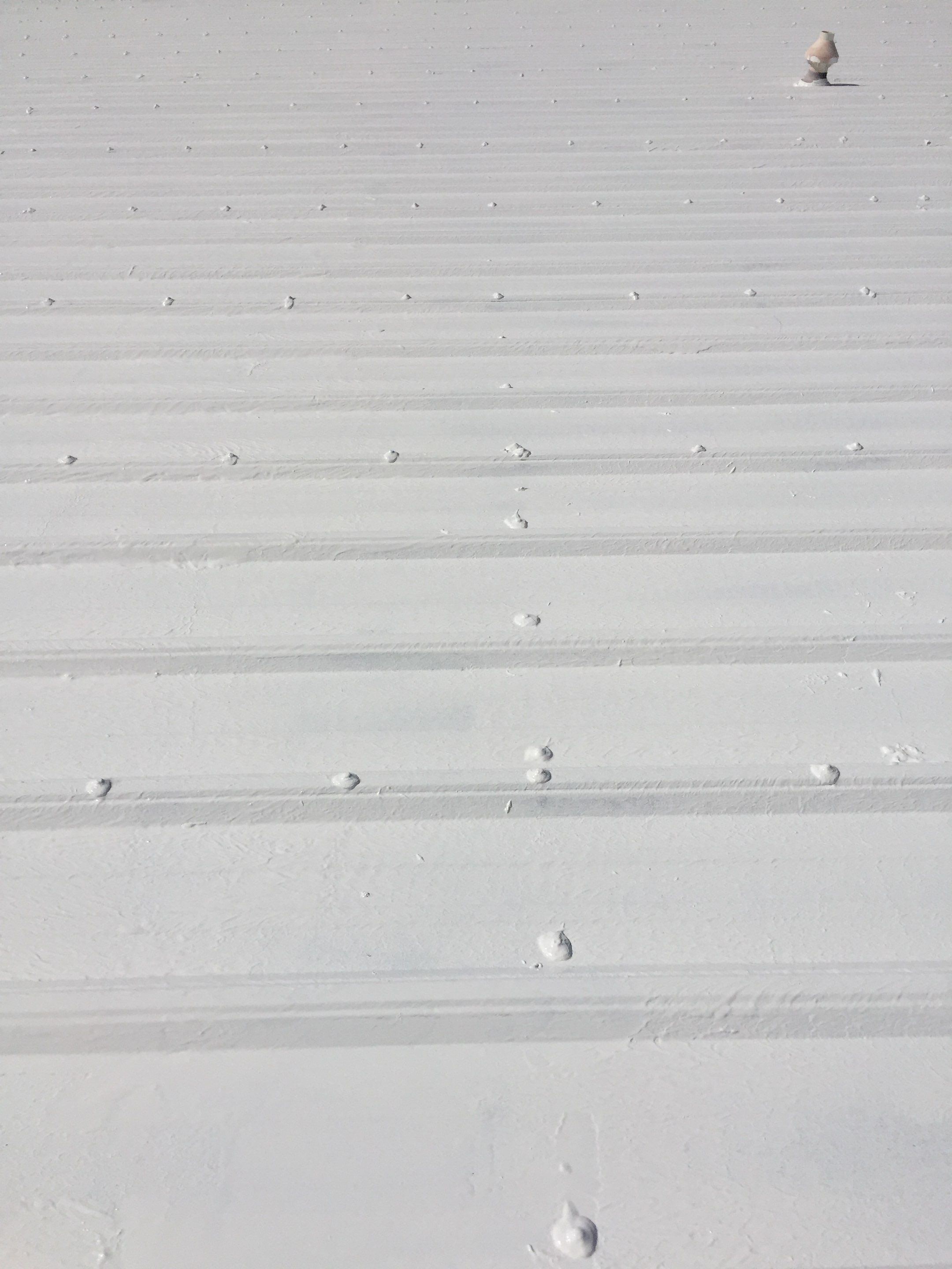 Commercial Roof Coating using Gaco Silicone Roof Coating by Secure Construction Company Inc