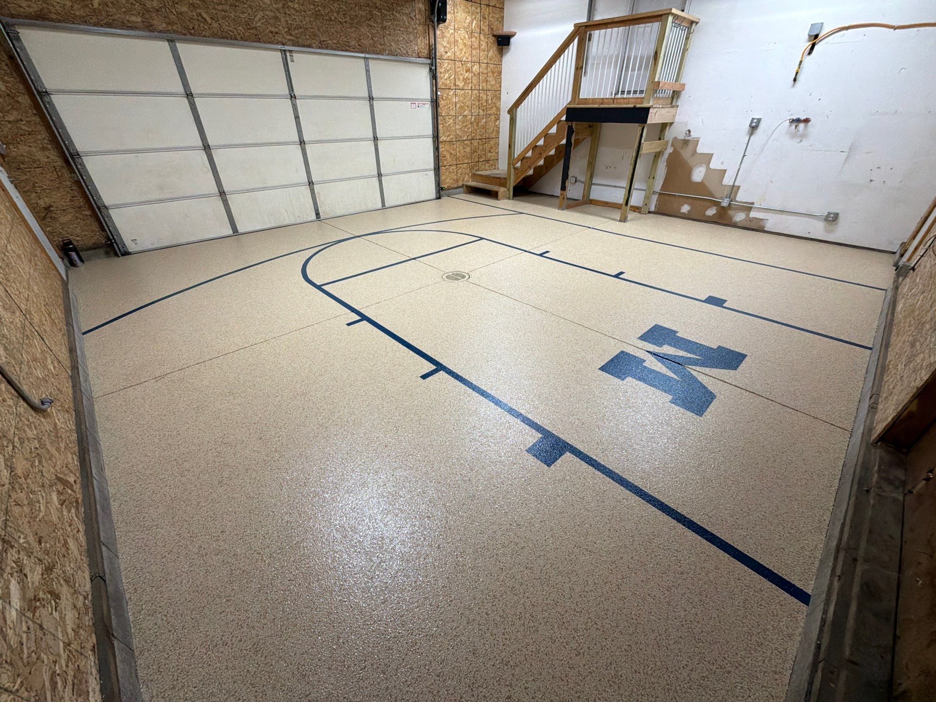 Custom Epoxy Garage Floor Completed In Norton Shores Michigan by Gordon Painting