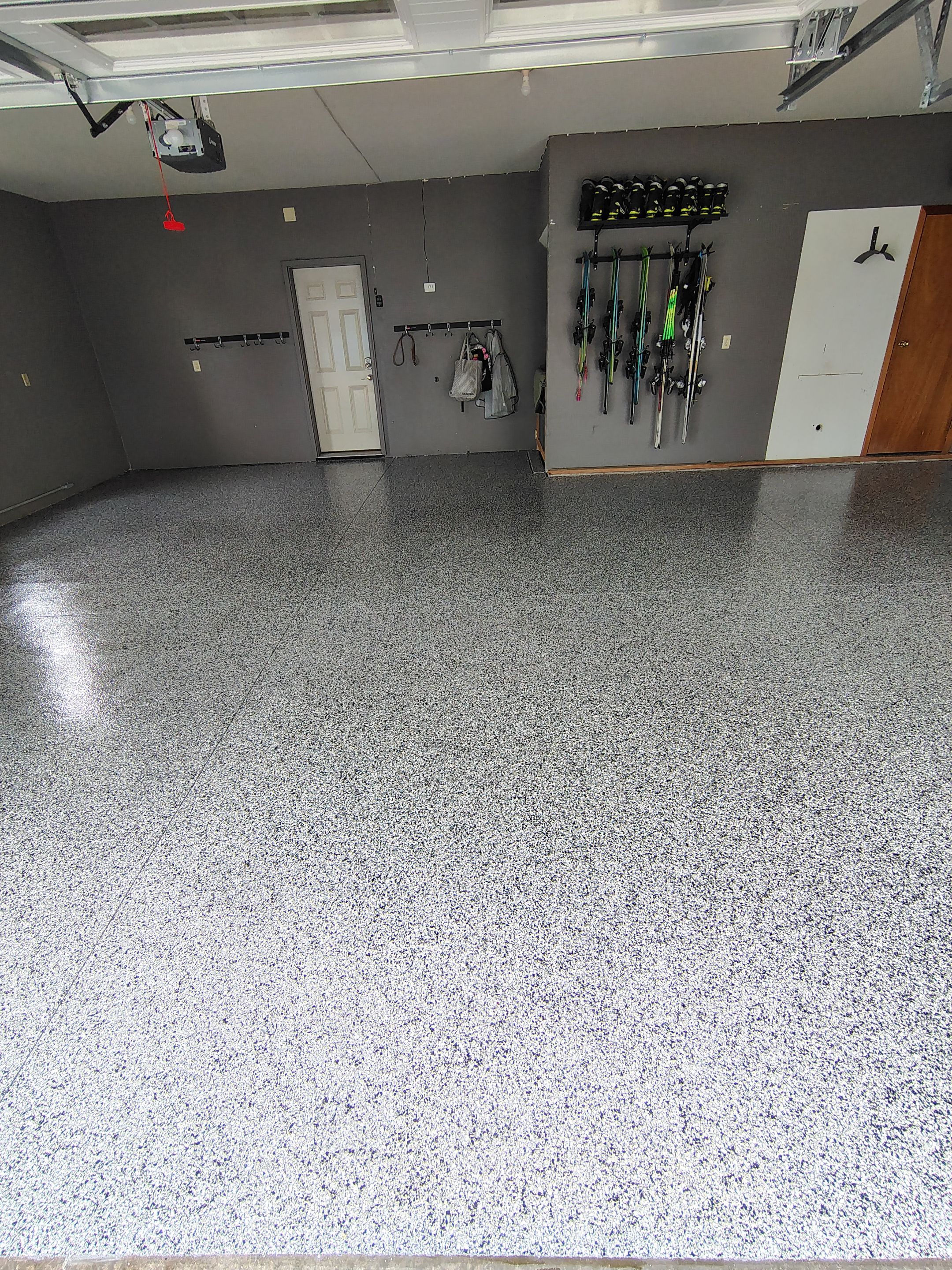 Garage Floor Concrete Coating and Crack Repair in Sioux Falls by Select Painting, Coatings & Garage Cabinets