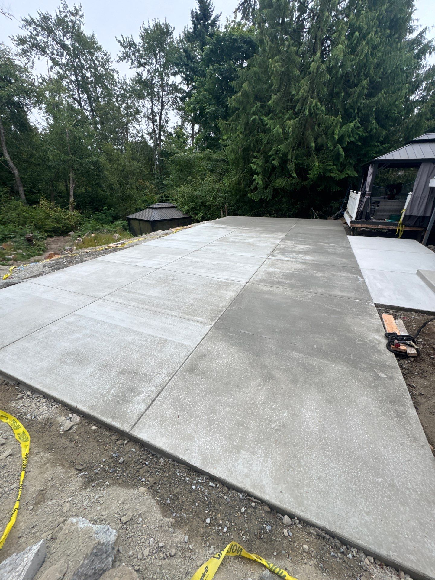 Concrete Back Patio Makeover  by Jireh Asphalt & Concrete Inc 