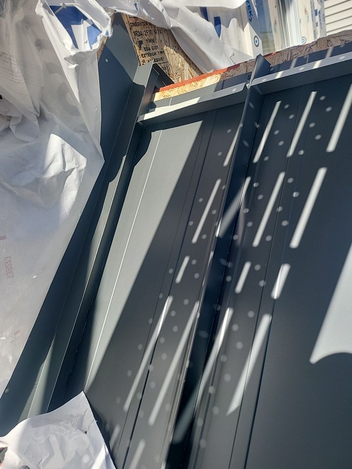 Siding Installation using Hardie Plank Aged Pewter by A Plus Exterior