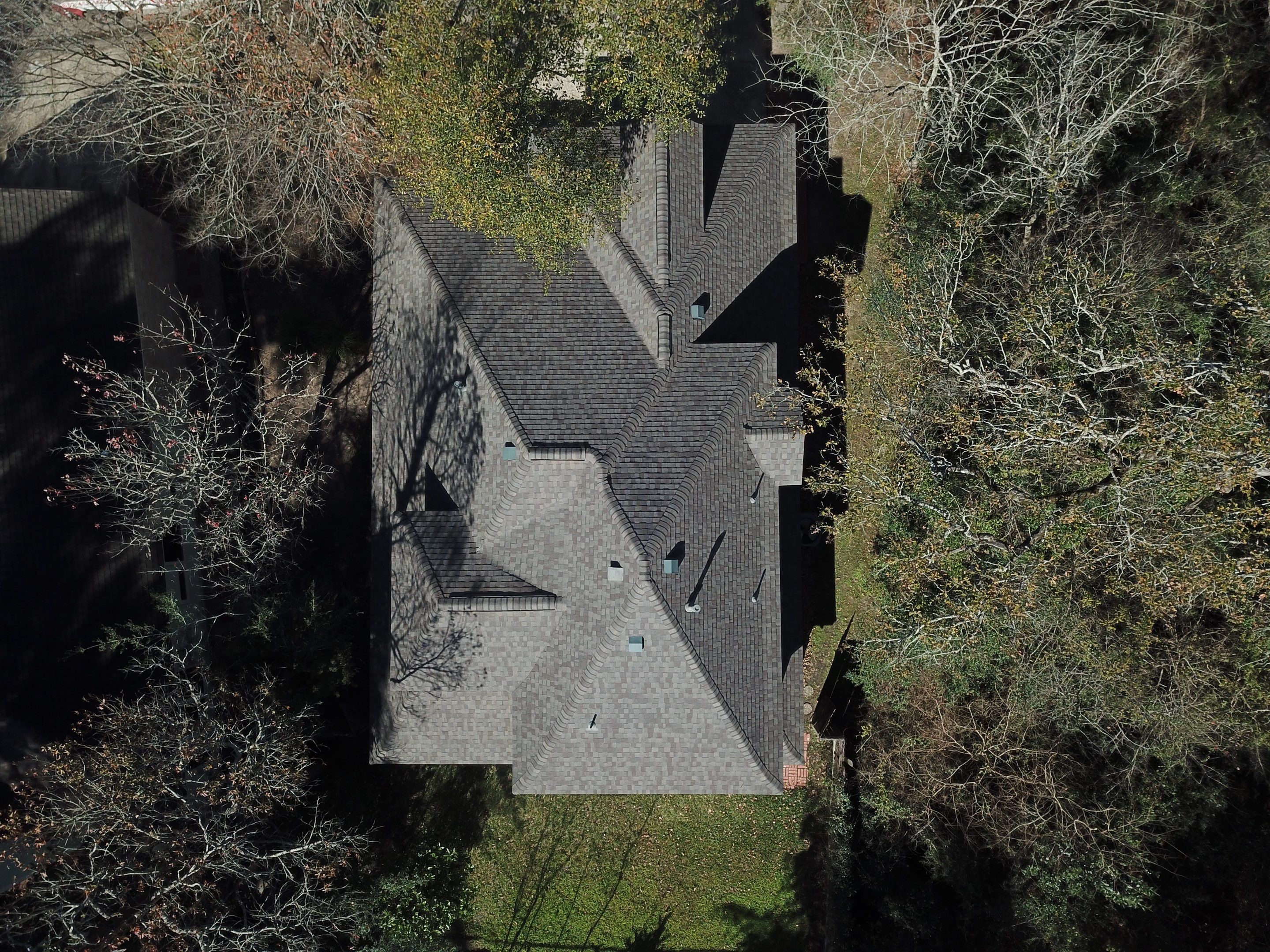 OC Duration Driftwood by HHH Roofing & Construction