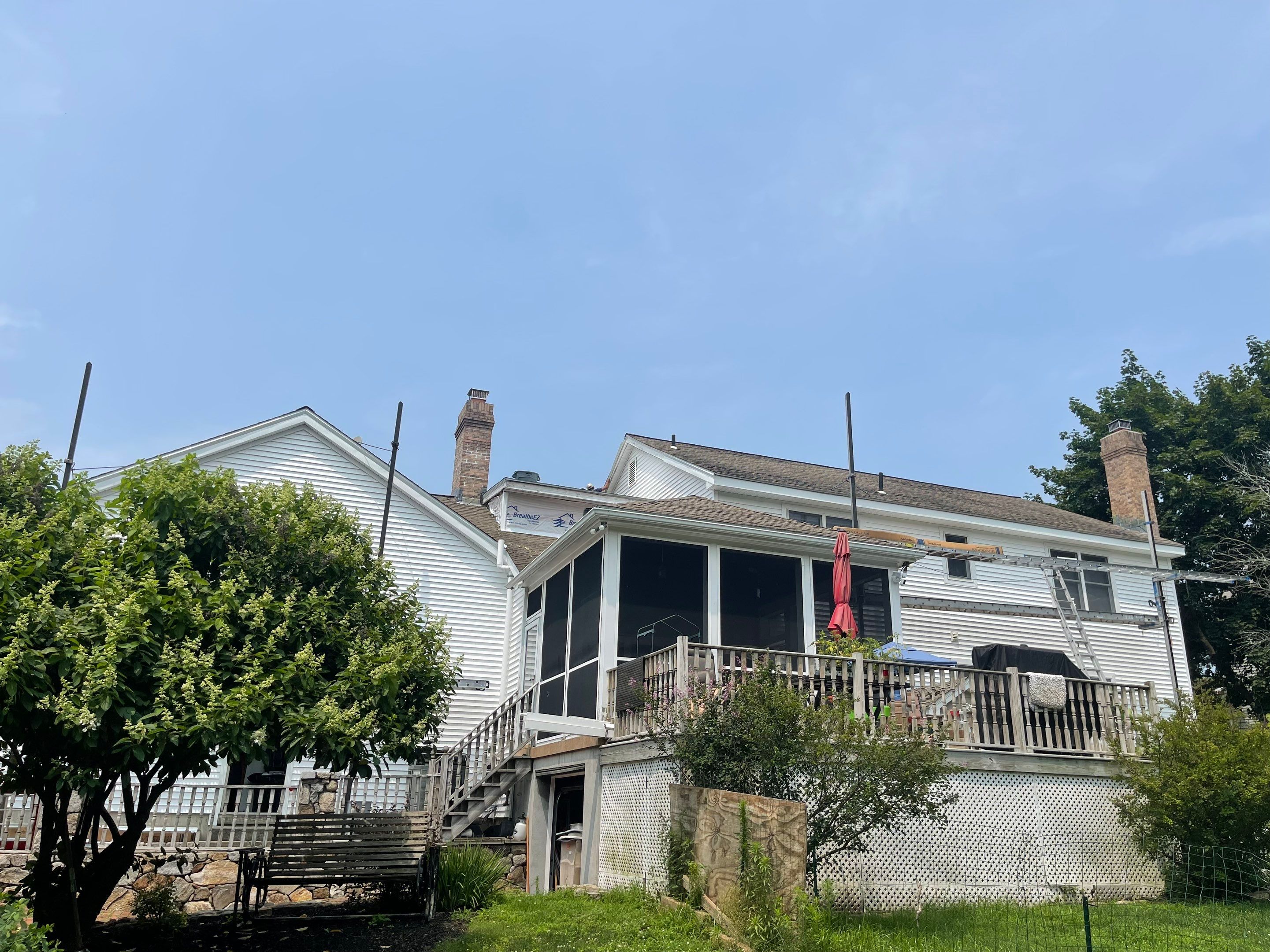 Siding Installation using Mainstreet Colonial & White gutters by A Plus Exterior