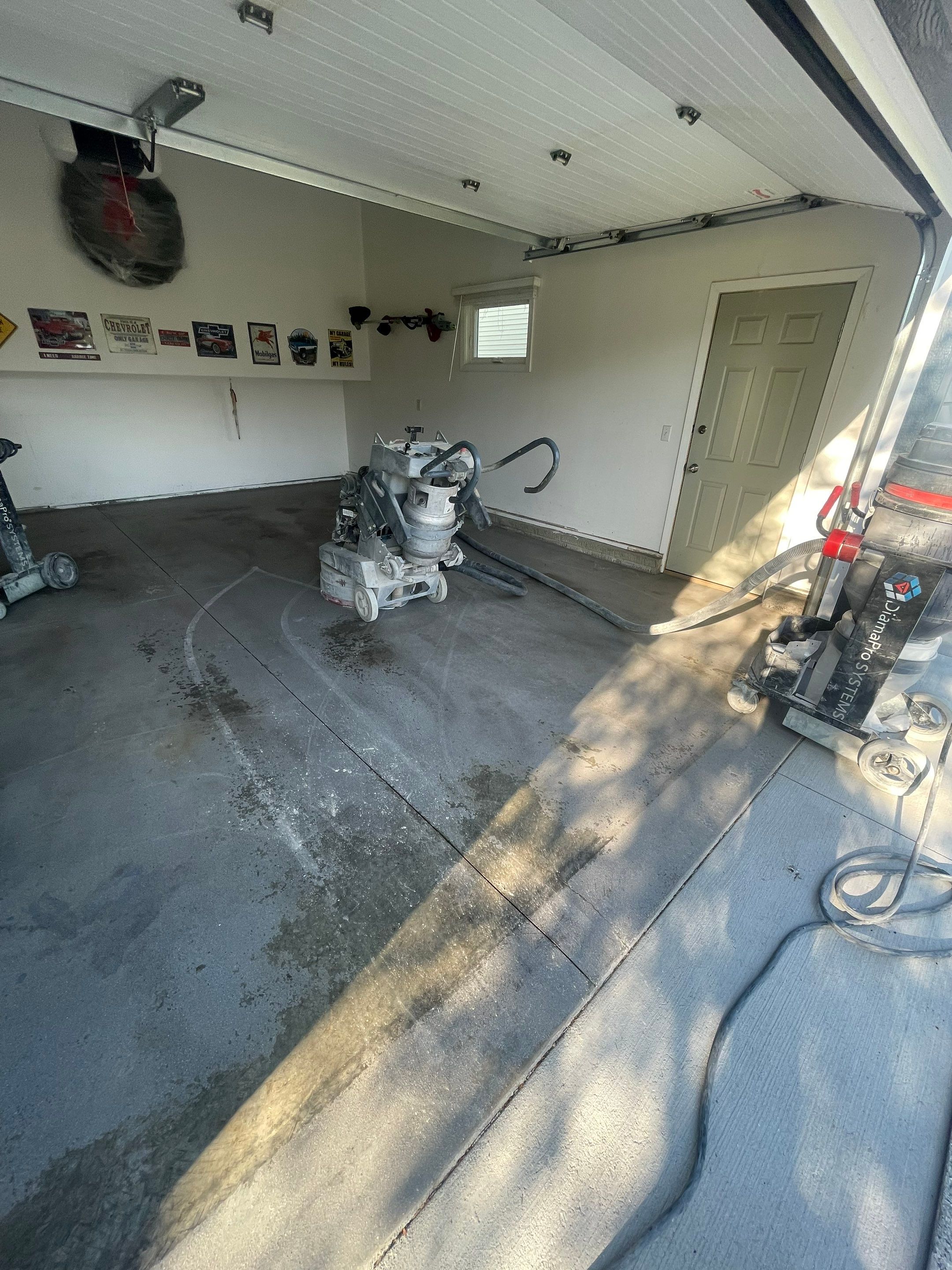 Sioux Falls Garage Floor Coating with Nightfall Decorative Chips by Select Painting, Coatings & Garage Cabinets