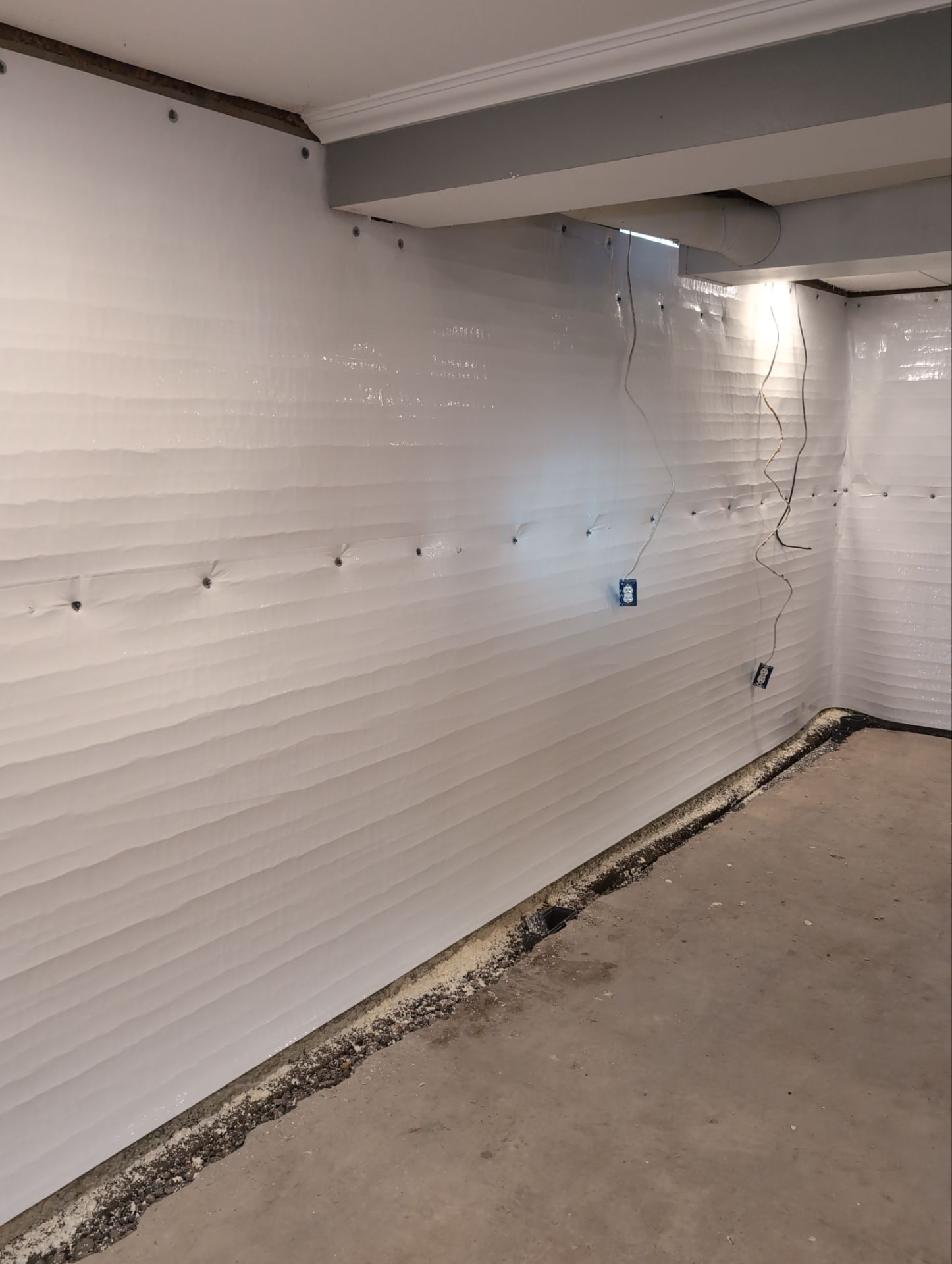 Interior Basement Waterproofing System and Egress Window Installation by Toledo Basement Repair 