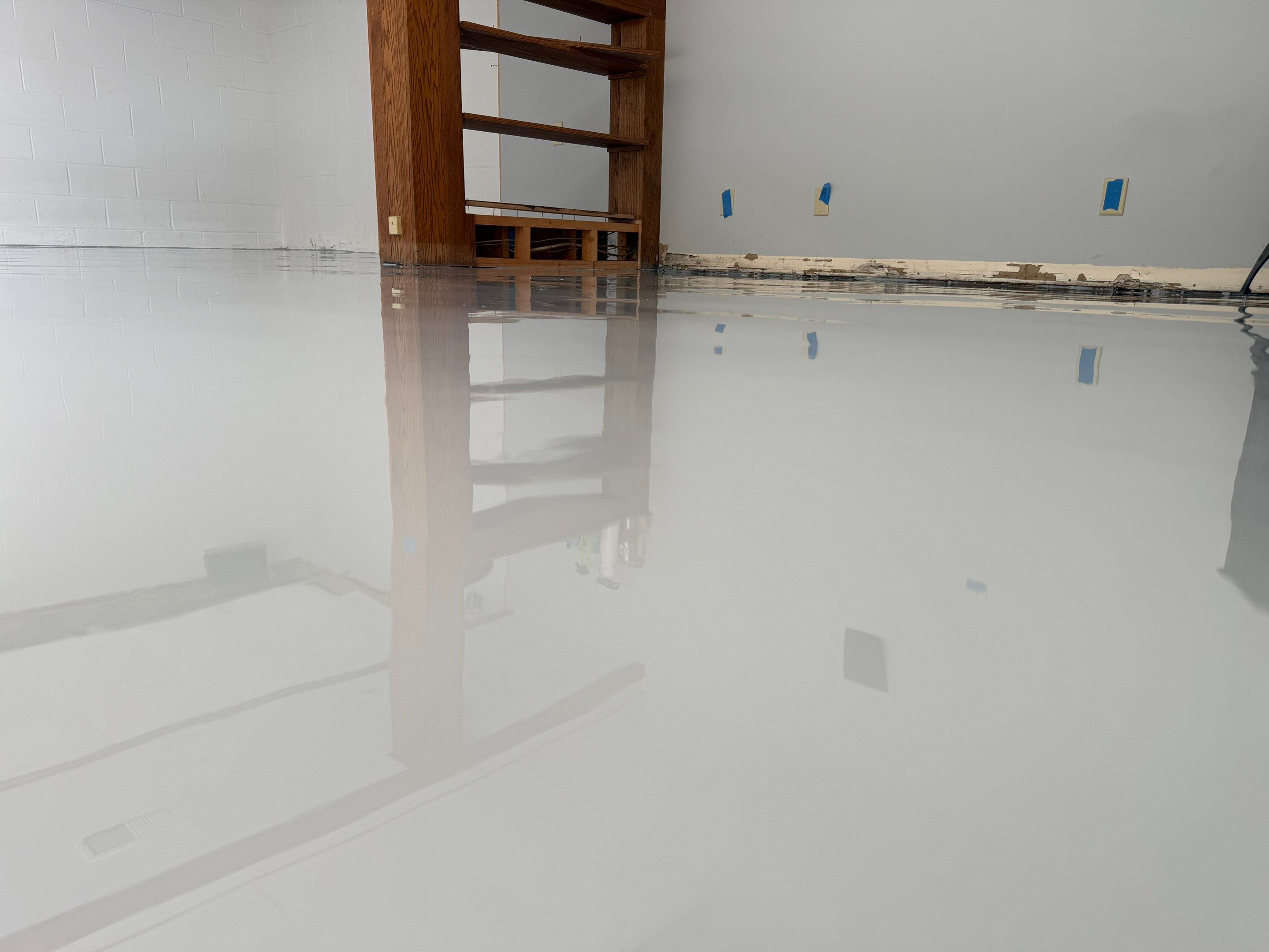 Solid Color Concrete Floor Coating for Renner Basement by Select Painting, Coatings & Garage Cabinets