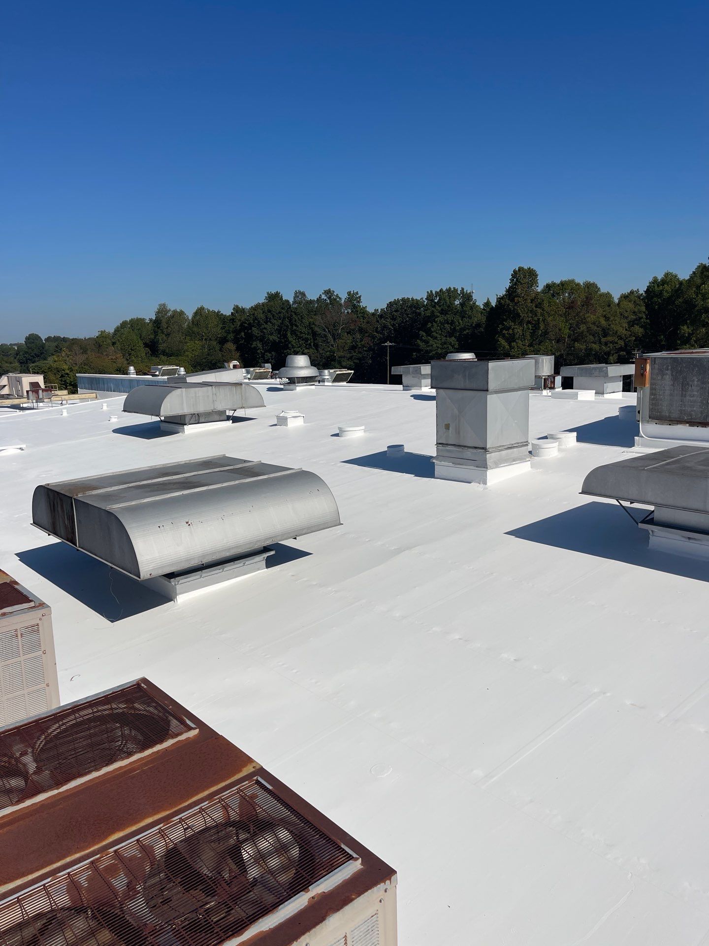 Commercial Roofing Installation using Coatings by Kentucky Commercial Roofing
