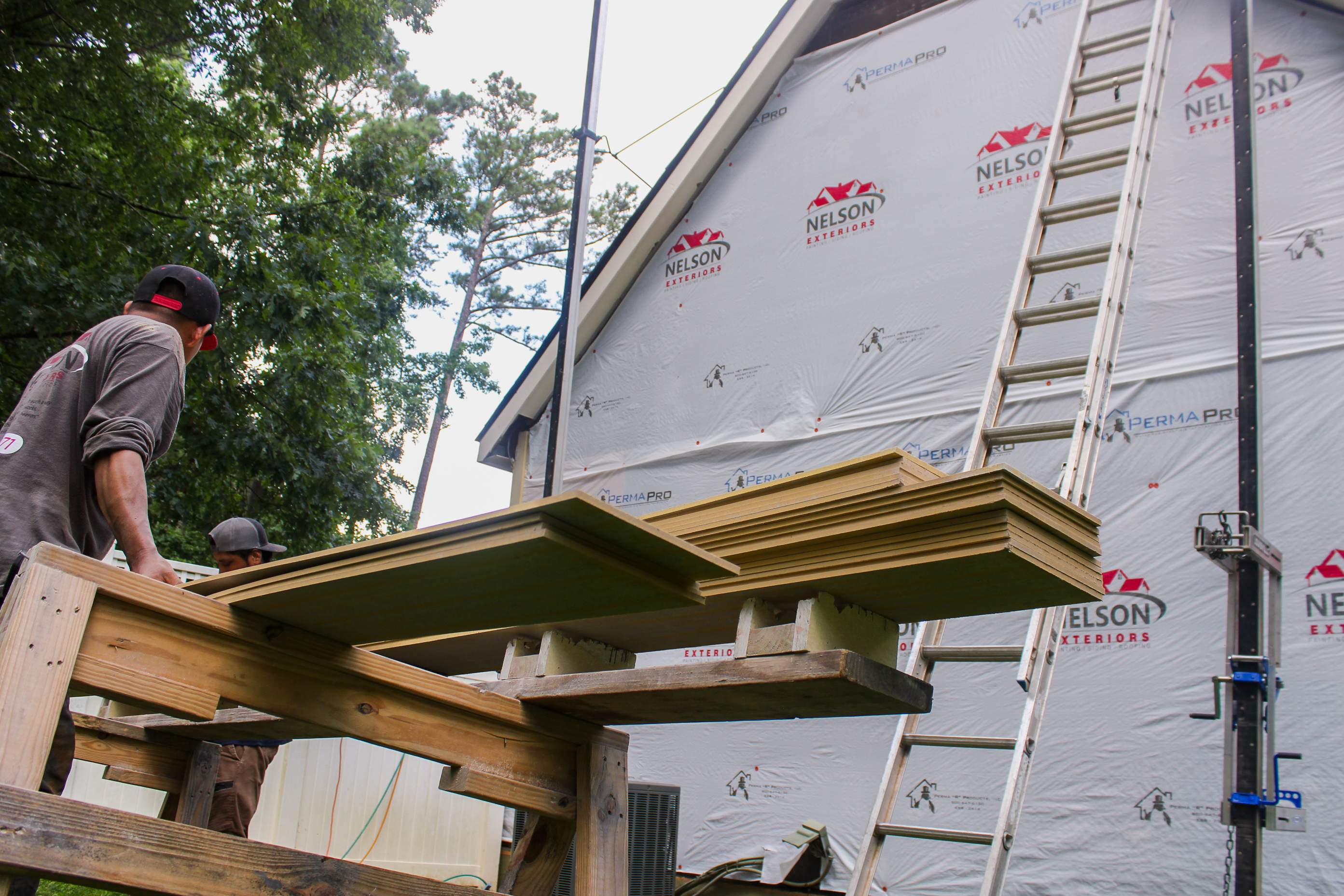 James Hardie Siding Install, Rotten Wood and Gutter Replacement and Exterior Painting by Nelson Exteriors 