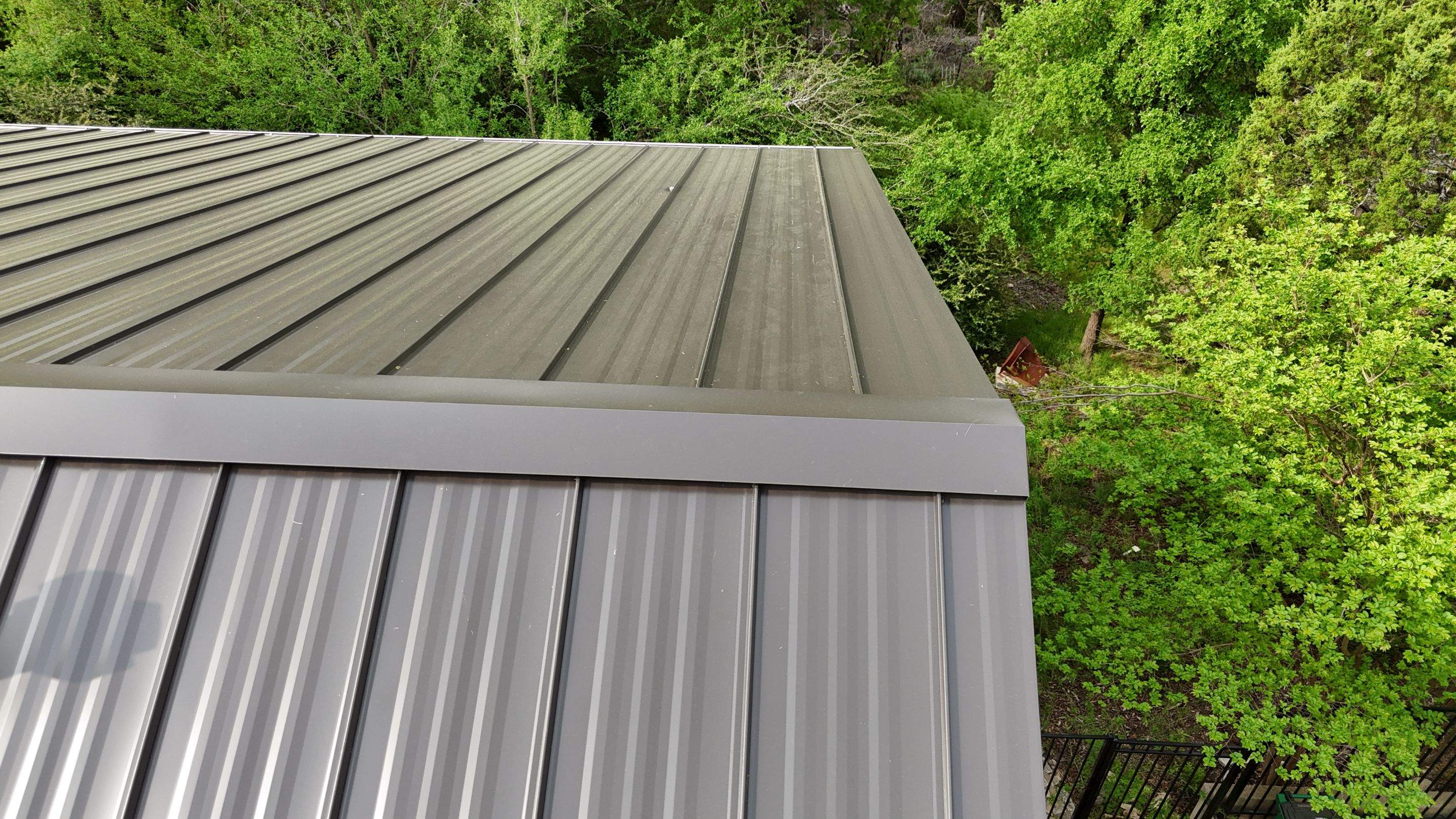 Dark Bronze - L&A Standing Seam with Striations by RoofsOnly.com