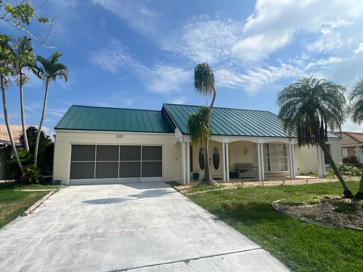 Residential Roofing Installation using Gulf Coast Metals Gulf Seam Panels by Four Peaks Roofing