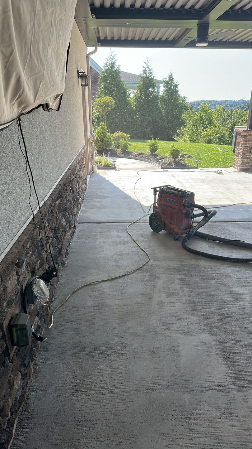 Large Patio + Garage Project in Moon Township by Floors in a Day, Inc